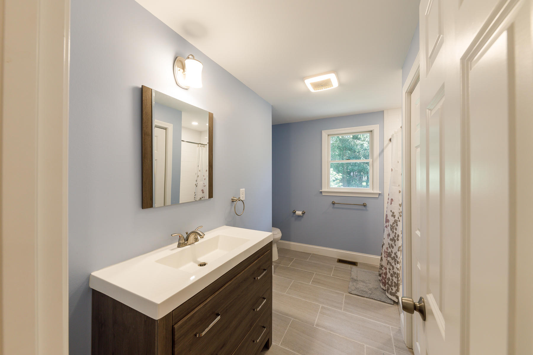 3 Rivers End Road East Falmouth, MA 02536 - Photo 18 of 38 a bathroom with a sink mirror and a vanity