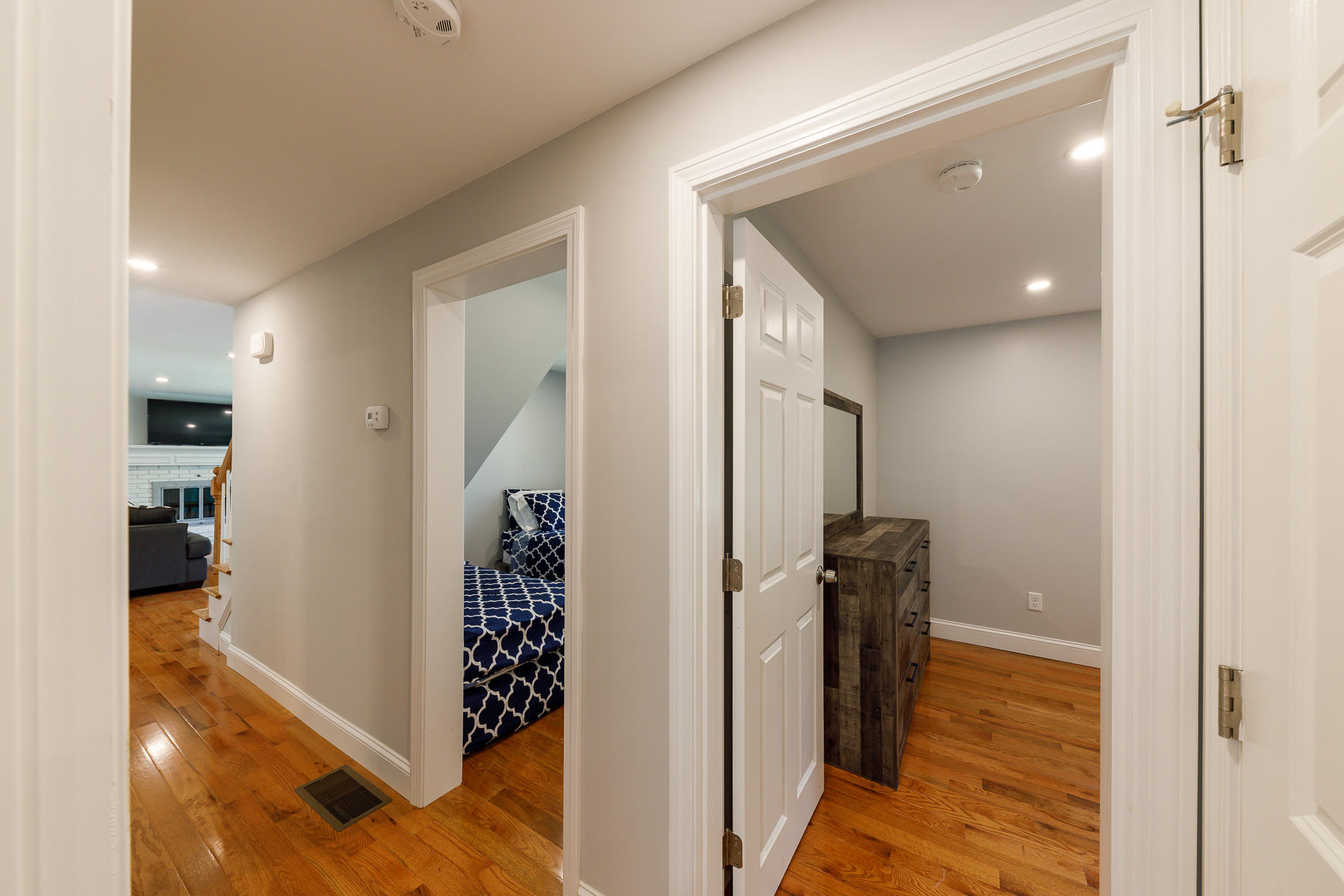 3 Rivers End Road East Falmouth, MA 02536 - Photo 21 of 38 a view of a hallway with wooden floor and staircase