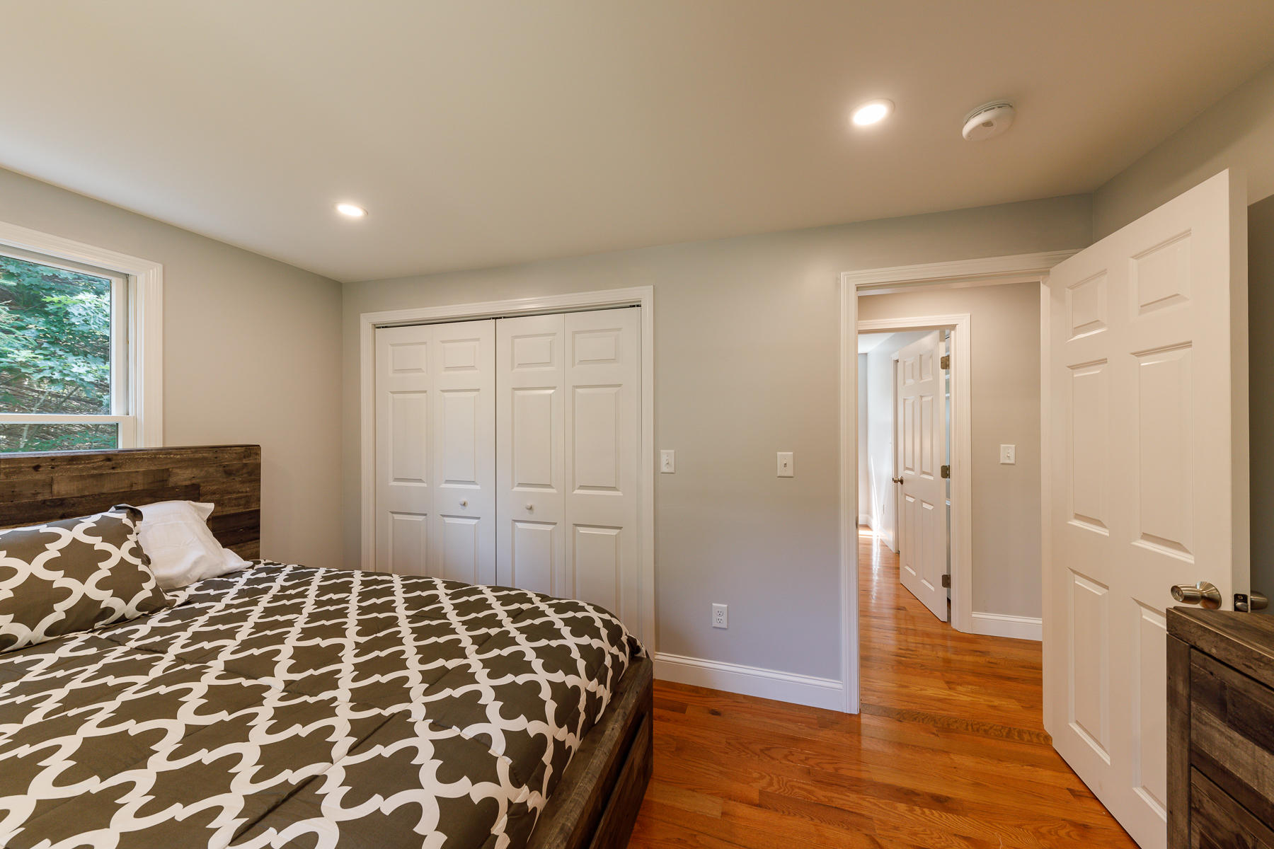 3 Rivers End Road East Falmouth, MA 02536 - Photo 23 of 38 a bedroom with a bed and wooden floor