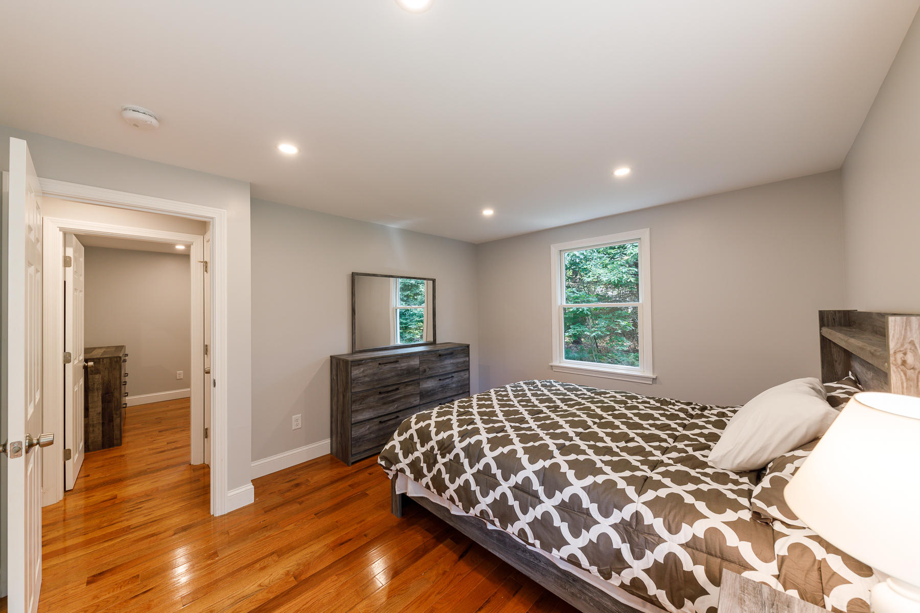 3 Rivers End Road East Falmouth, MA 02536 - Photo 24 of 38 a bedroom with a bed and wooden floor