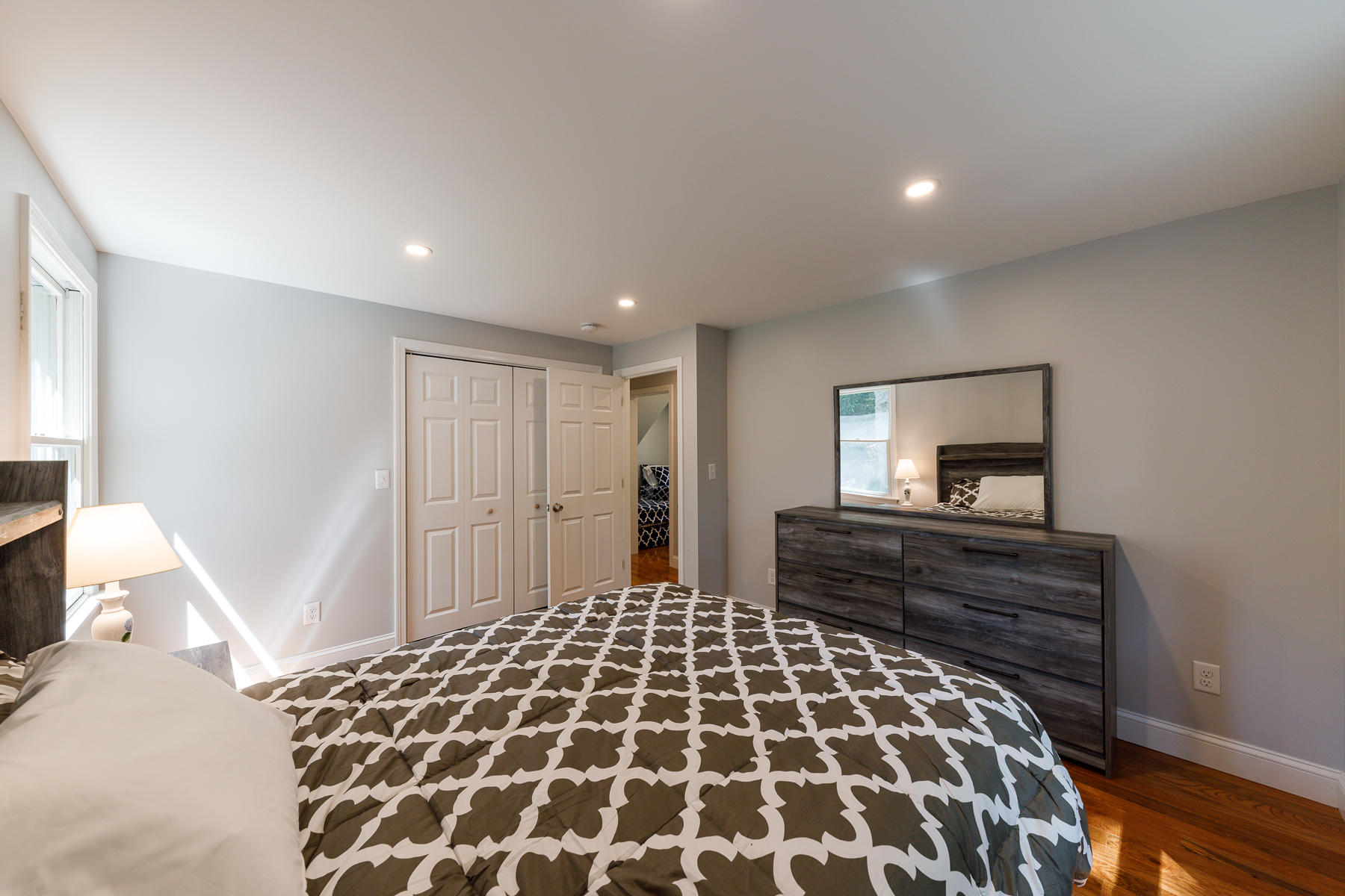 3 Rivers End Road East Falmouth, MA 02536 - Photo 25 of 38 a spacious bedroom with a bed and a dresser