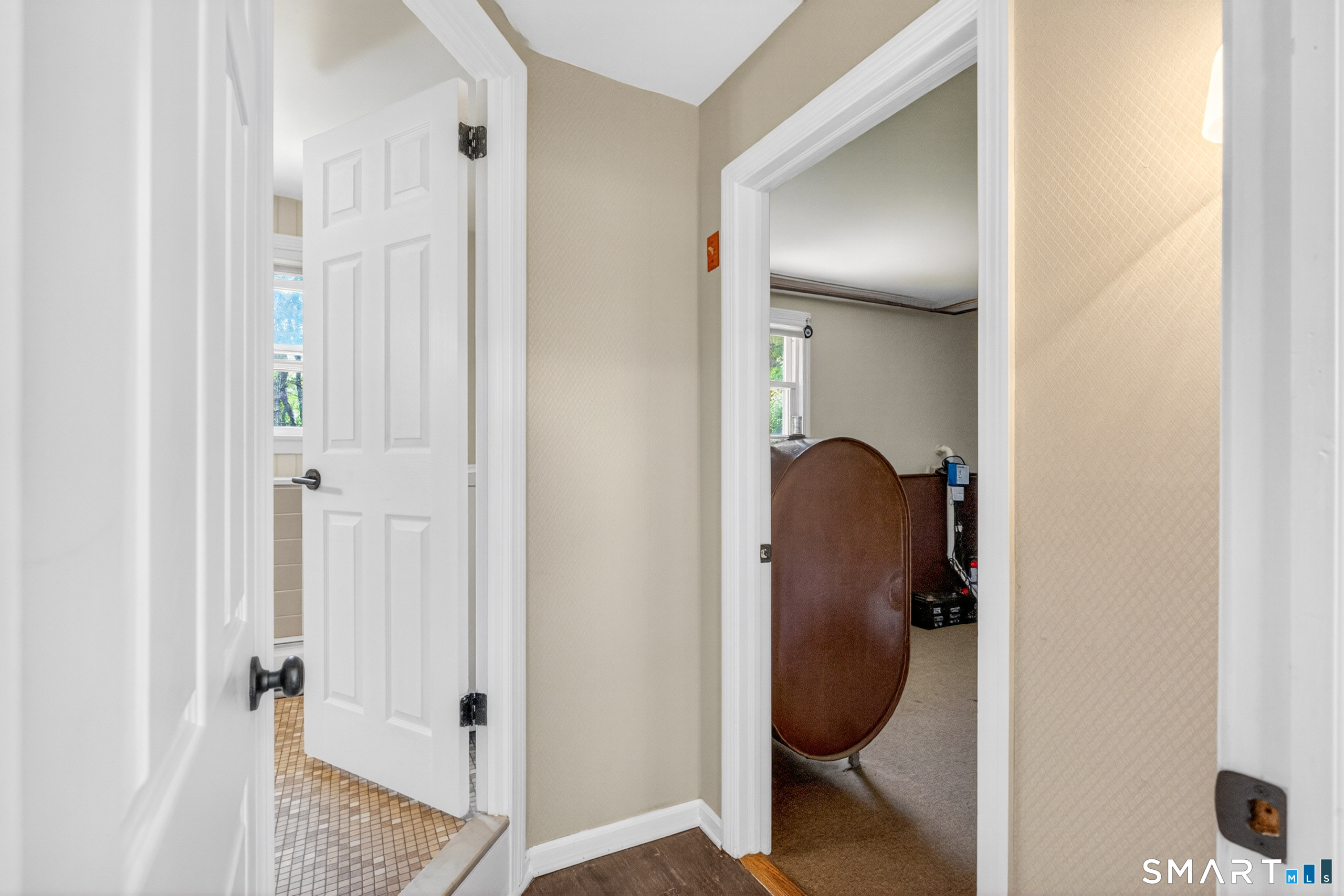 568 Wiese Road Cheshire, CT 06410 - Photo 31 of 40 a view of a hallway with closet and front door