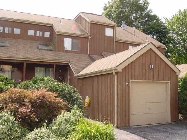 353 Papere Ridge, Unit 353 Shelton, CT 06484 - Photo 1 of 1 a front view of a house with a garden