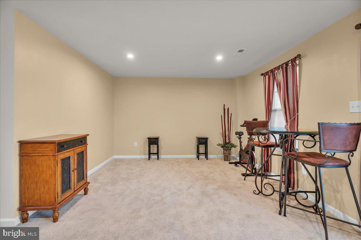 204 Freedom Way Sicklerville, NJ 08081 - Photo 14 of 32 Spacious room with warm tones.