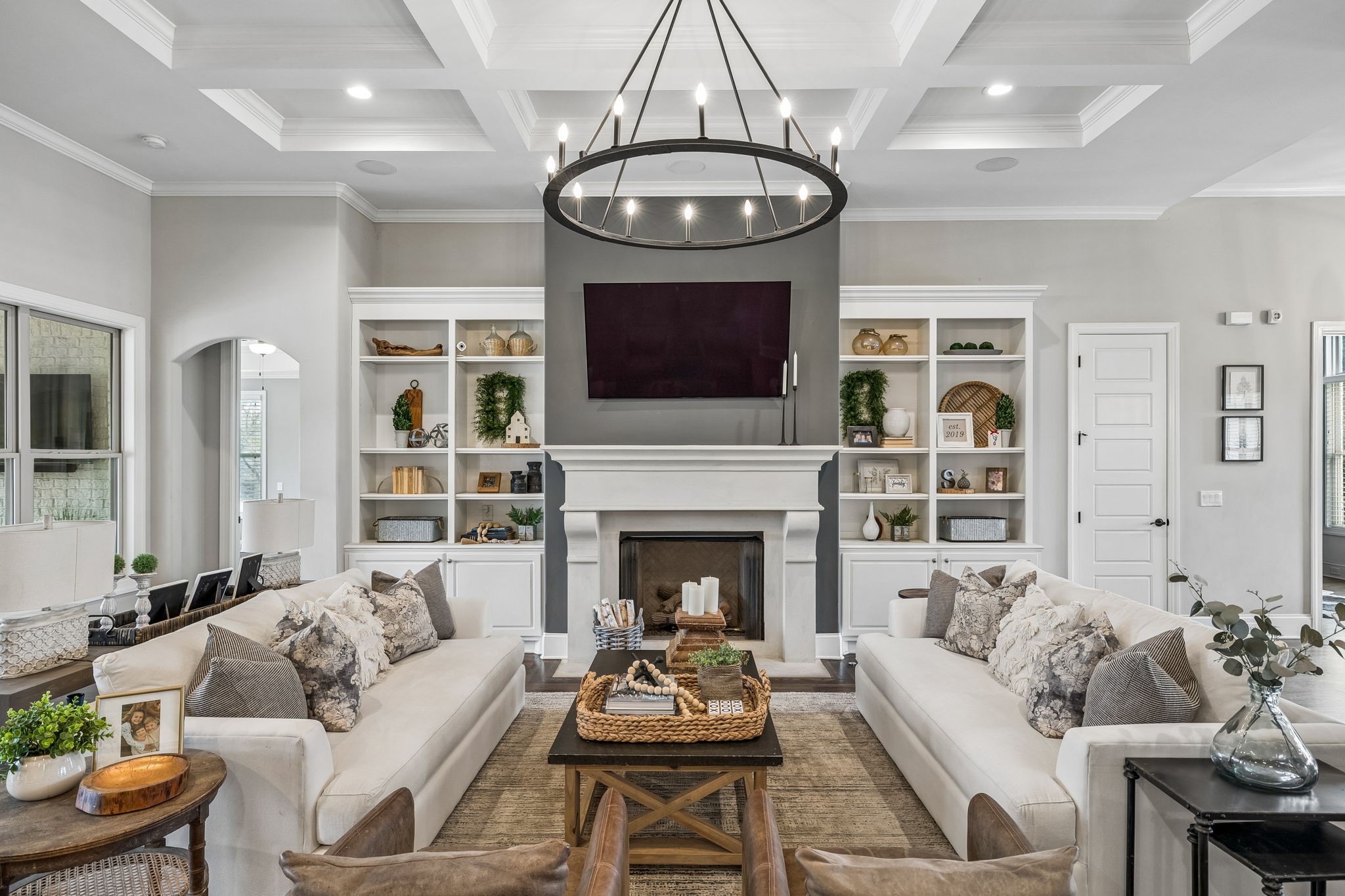 4035 Old Light Circle Arrington, TN 37014 - Photo 16 of 62 a living room with furniture a fireplace and a flat screen tv