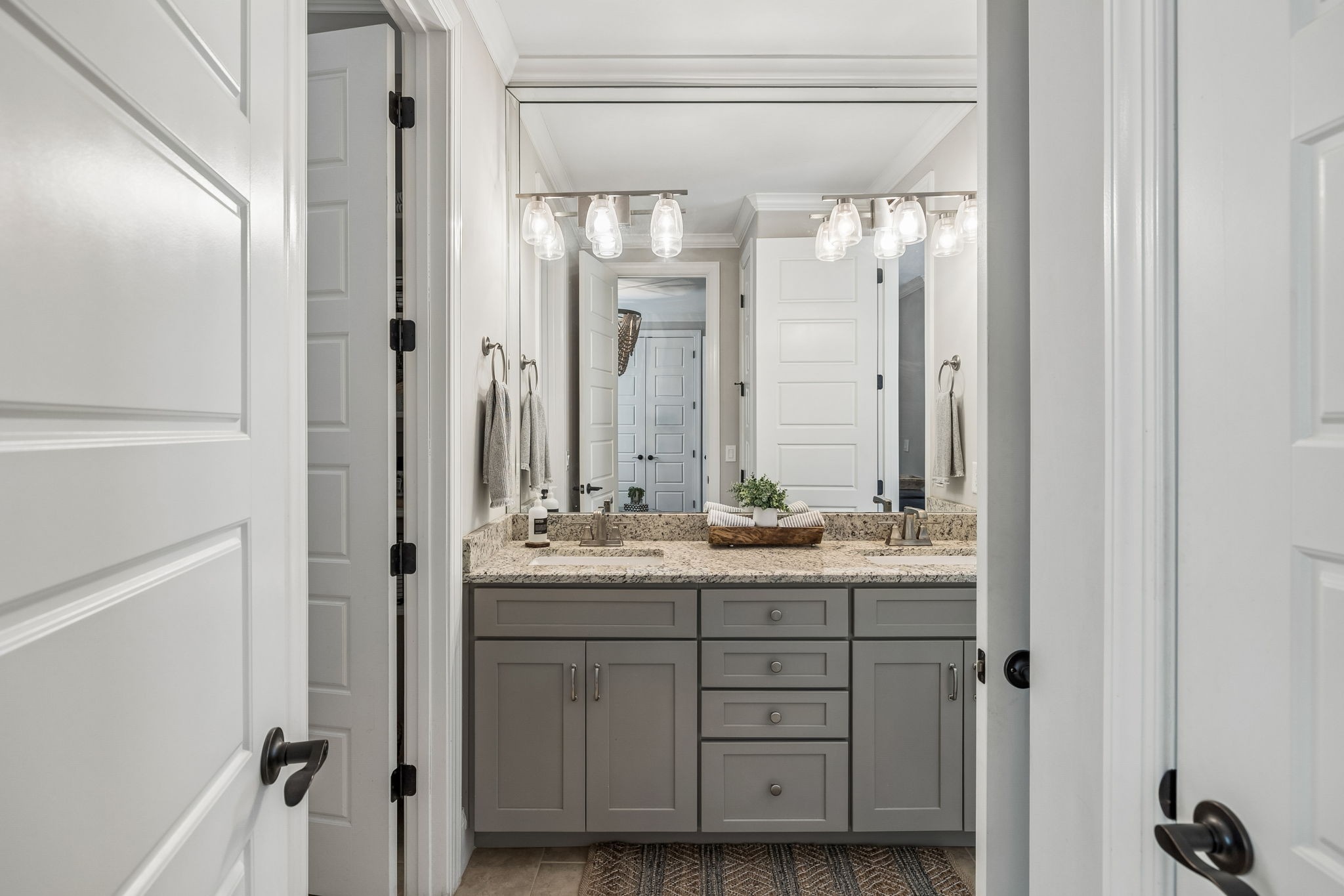 4035 Old Light Circle Arrington, TN 37014 - Photo 29 of 62 a bathroom with a double vanity sink mirror and double