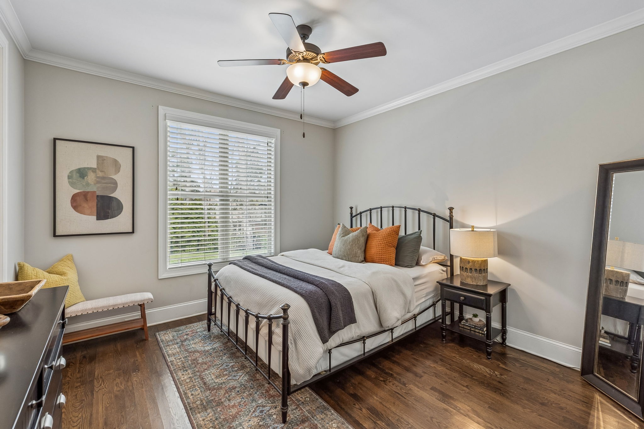 4035 Old Light Circle Arrington, TN 37014 - Photo 30 of 62 a bedroom with a bed and a chandelier