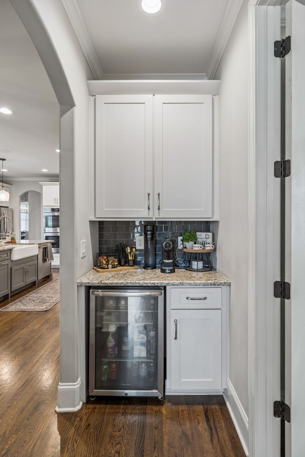4035 Old Light Circle Arrington, TN 37014 - Photo 32 of 62 a kitchen with stainless steel appliances granite countertop a stove and white cabinets