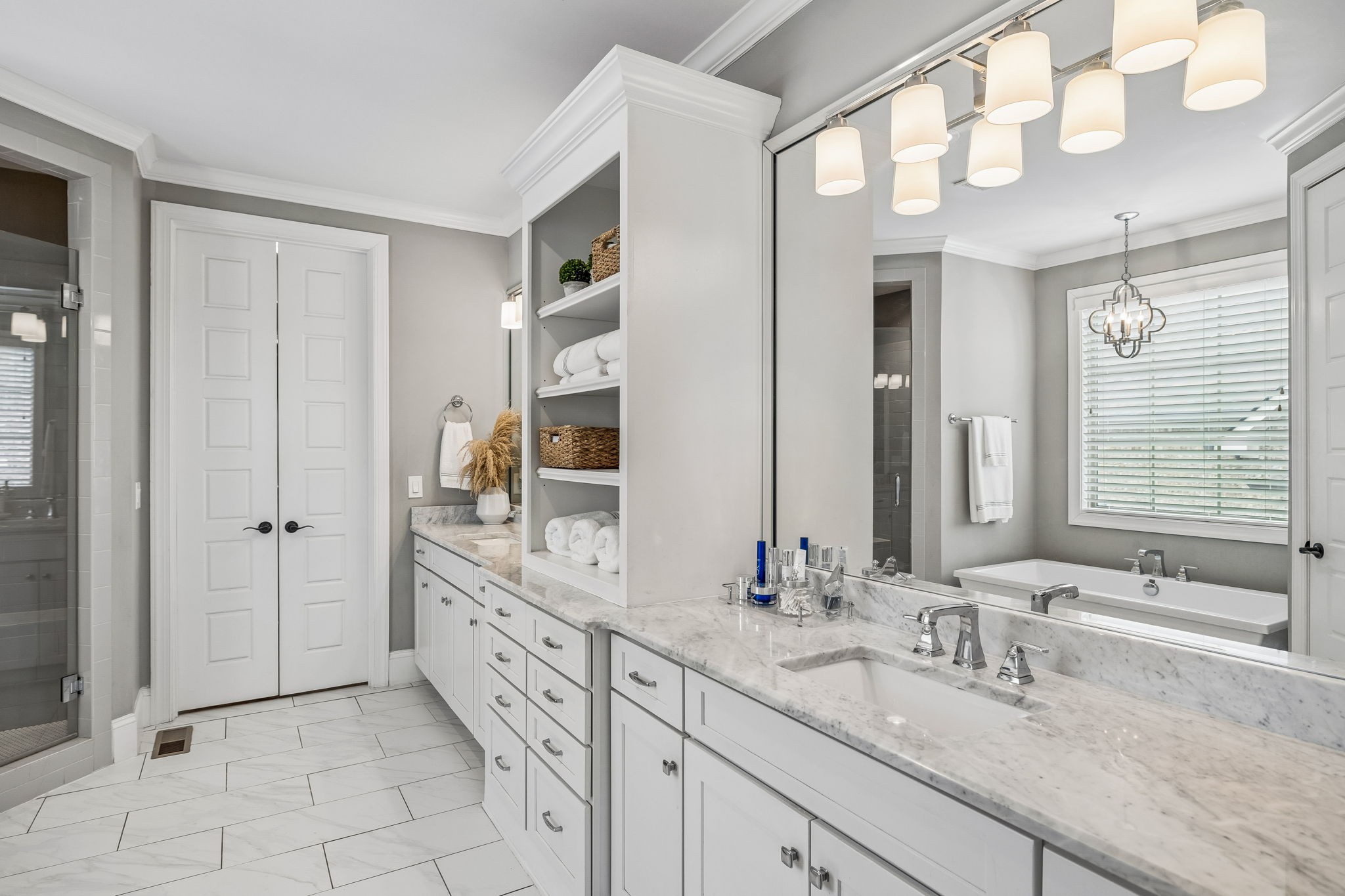 4035 Old Light Circle Arrington, TN 37014 - Photo 36 of 62 a bathroom with double sink and a mirror