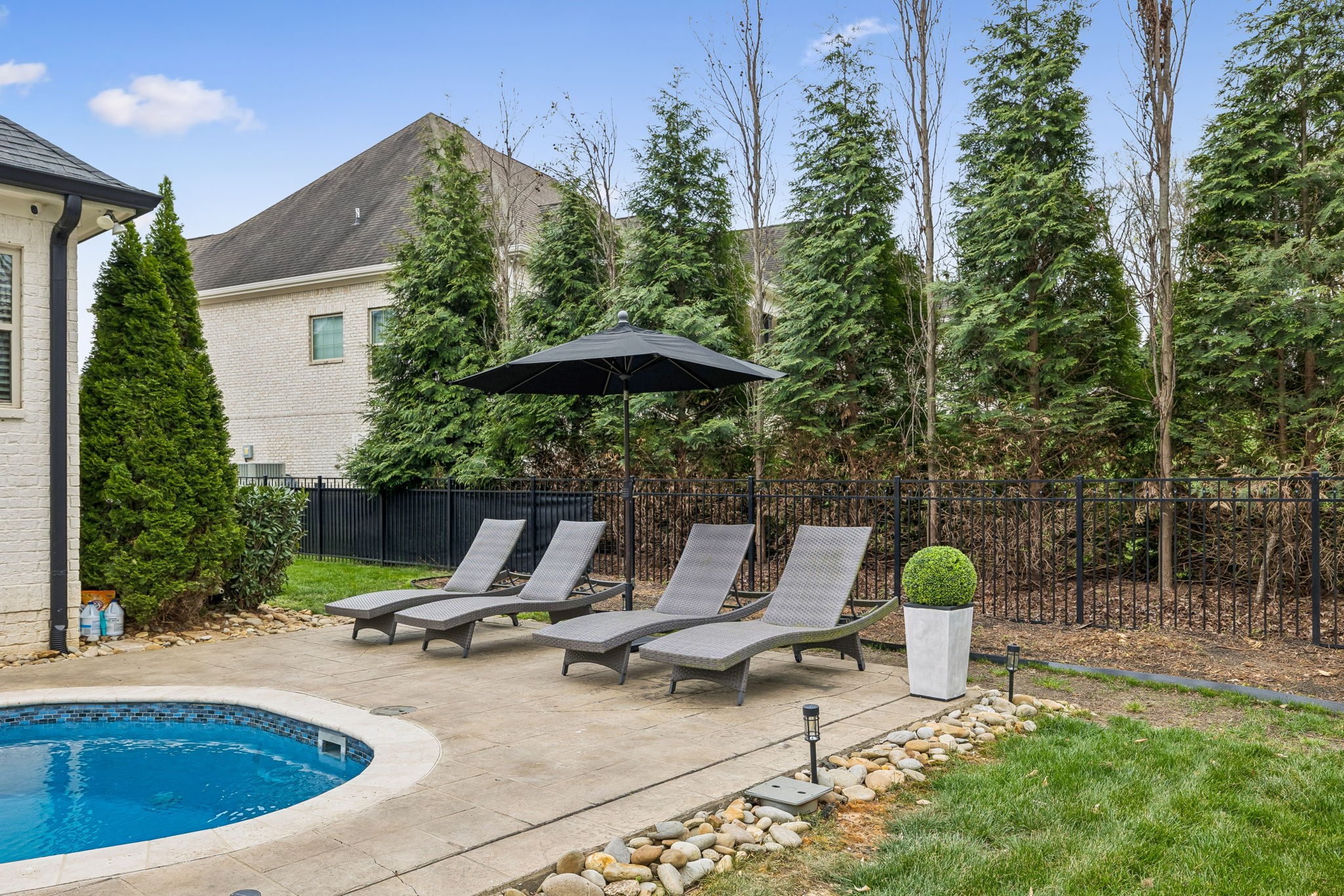 4035 Old Light Circle Arrington, TN 37014 - Photo 54 of 62 a view of a swimming pool with a patio and fire pit