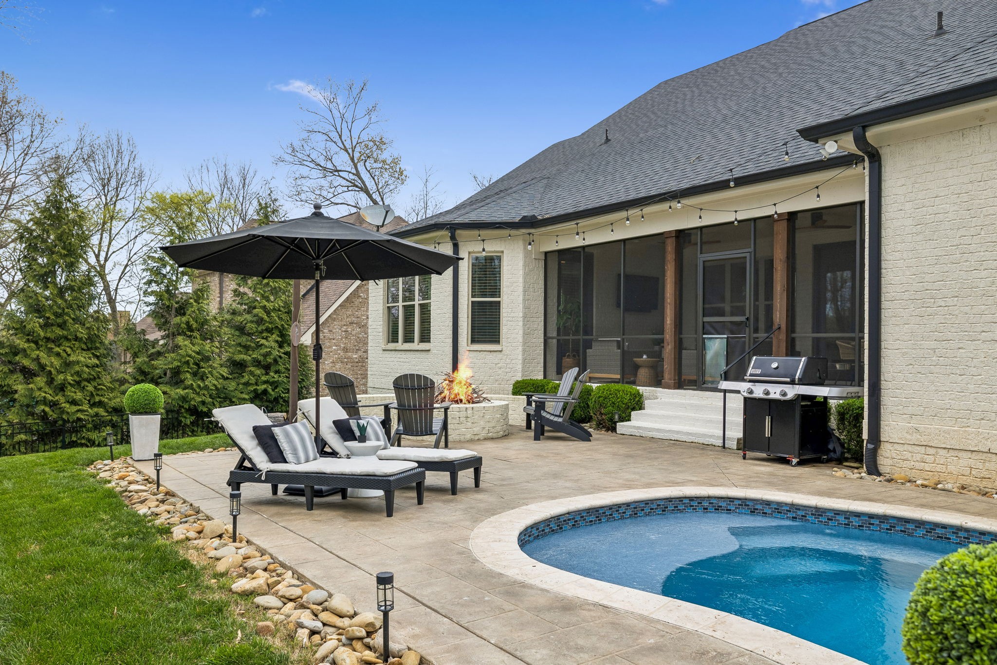 4035 Old Light Circle Arrington, TN 37014 - Photo 55 of 62 a view of a house with a patio and a yard
