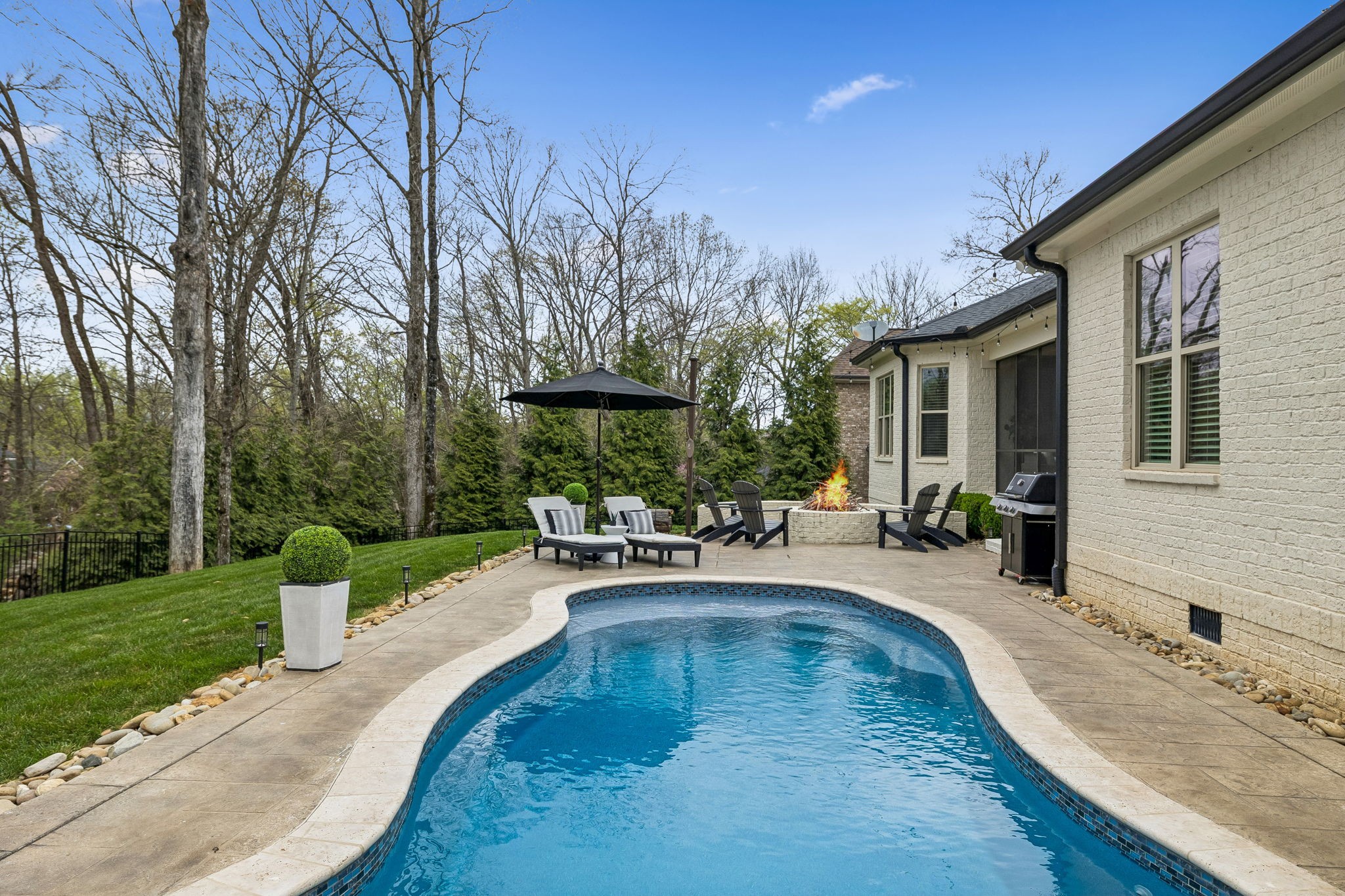 4035 Old Light Circle Arrington, TN 37014 - Photo 56 of 62 a swimming pool with outdoor seating and yard