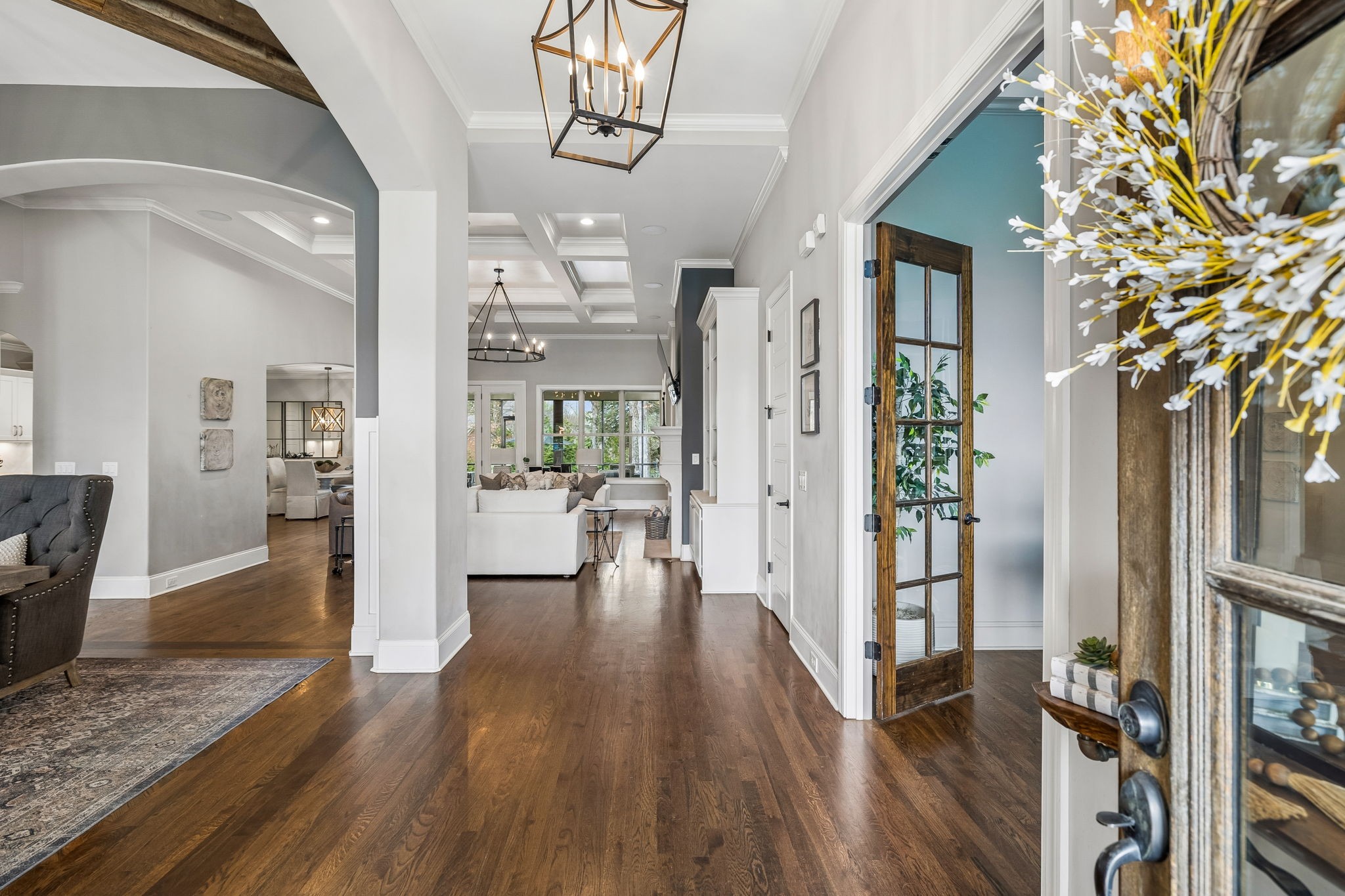 4035 Old Light Circle Arrington, TN 37014 - Photo 6 of 62 a view of a hallway with wooden floor and a livingroom