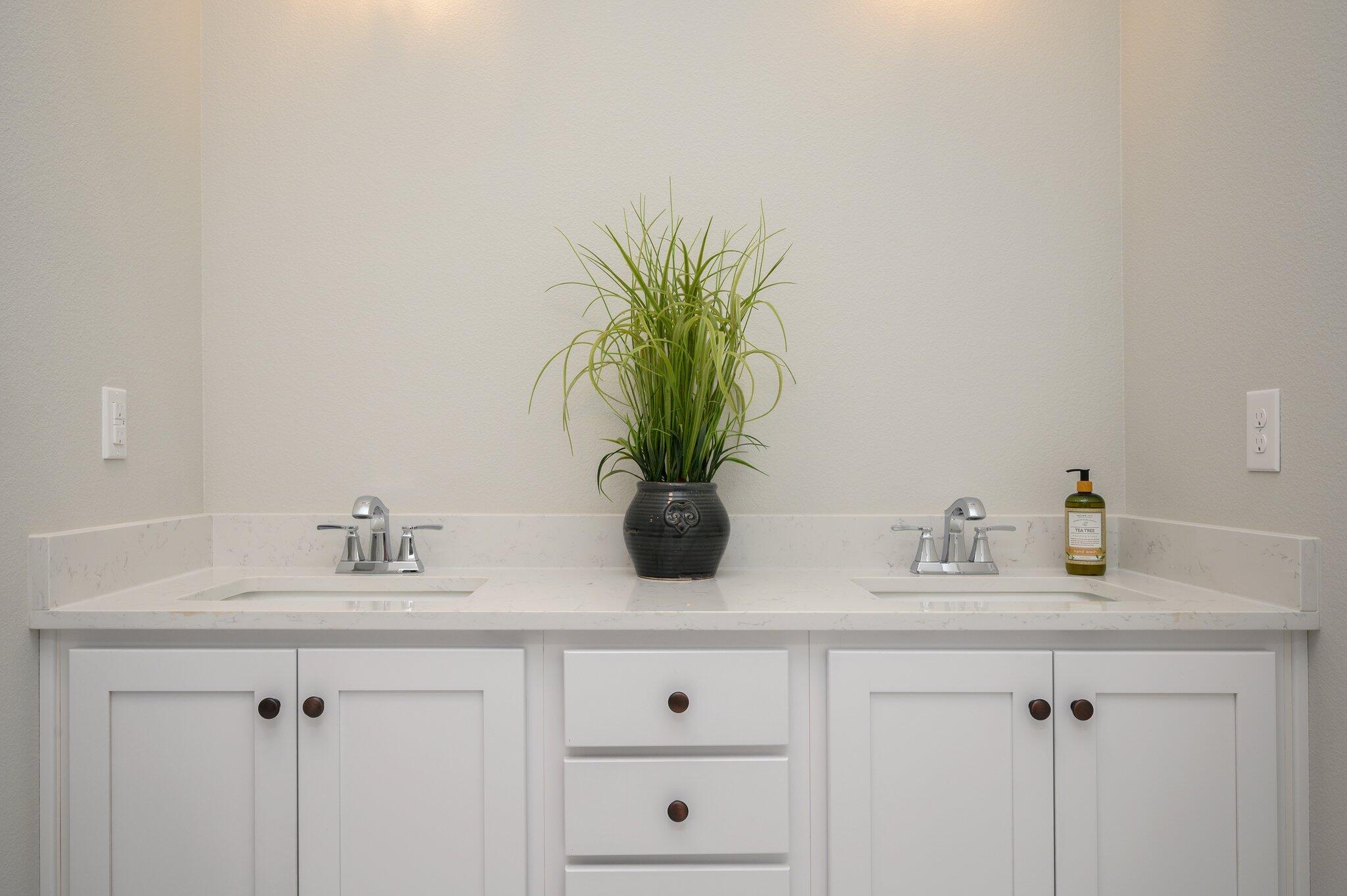 107 Winchester Way Crestview, FL 32539 - Photo 31 of 46 a bathroom with a sink a vanity and a mirror