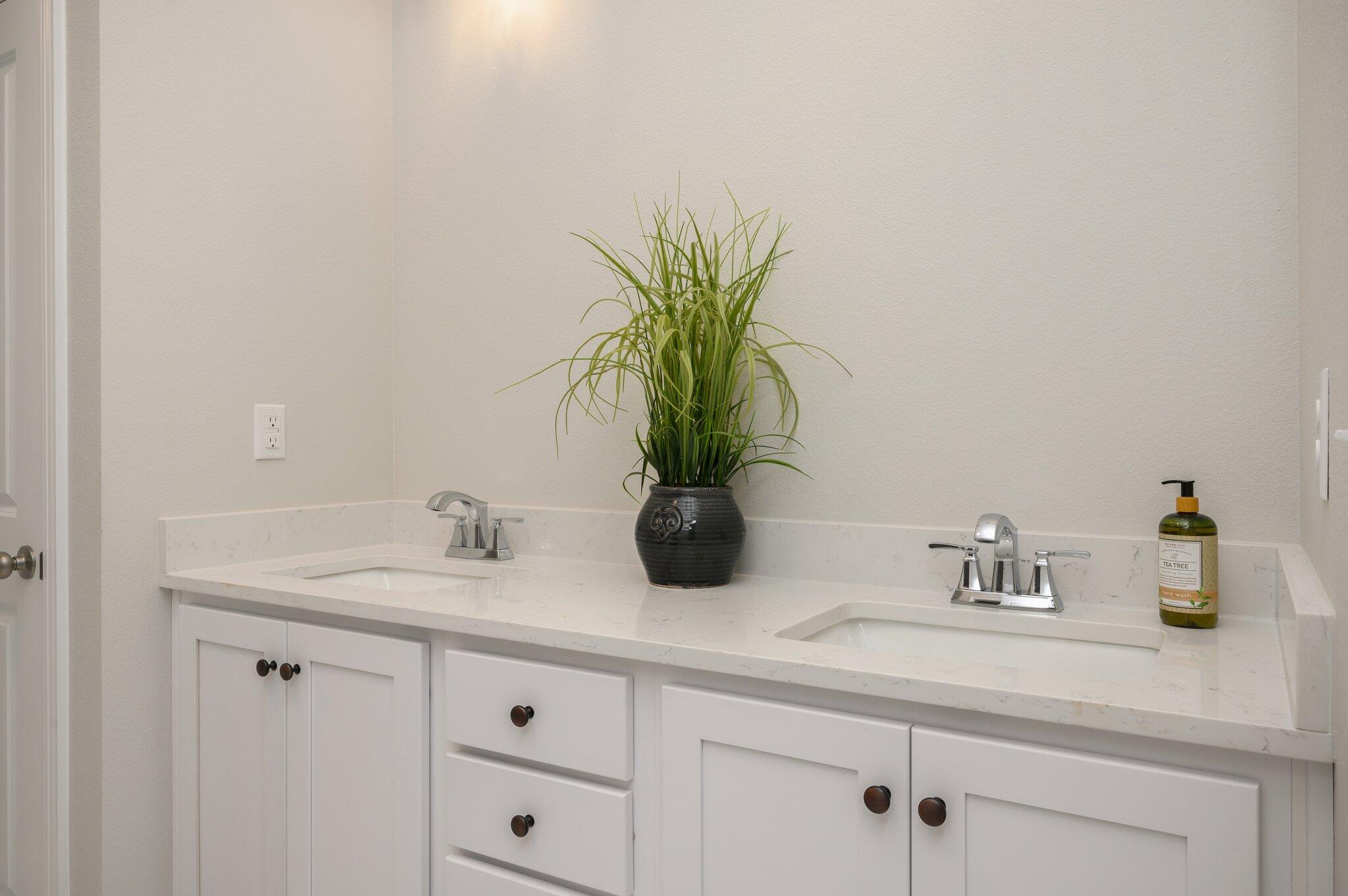 107 Winchester Way Crestview, FL 32539 - Photo 32 of 46 a bathroom with a sink a vanity and a mirror