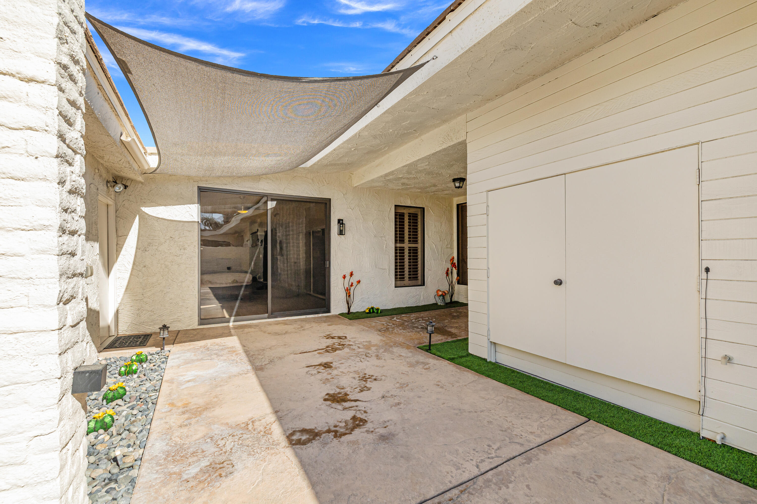 44828 Oro Grande Circle Indian Wells, CA 92210 - Photo 12 of 59 a view of a house with a patio