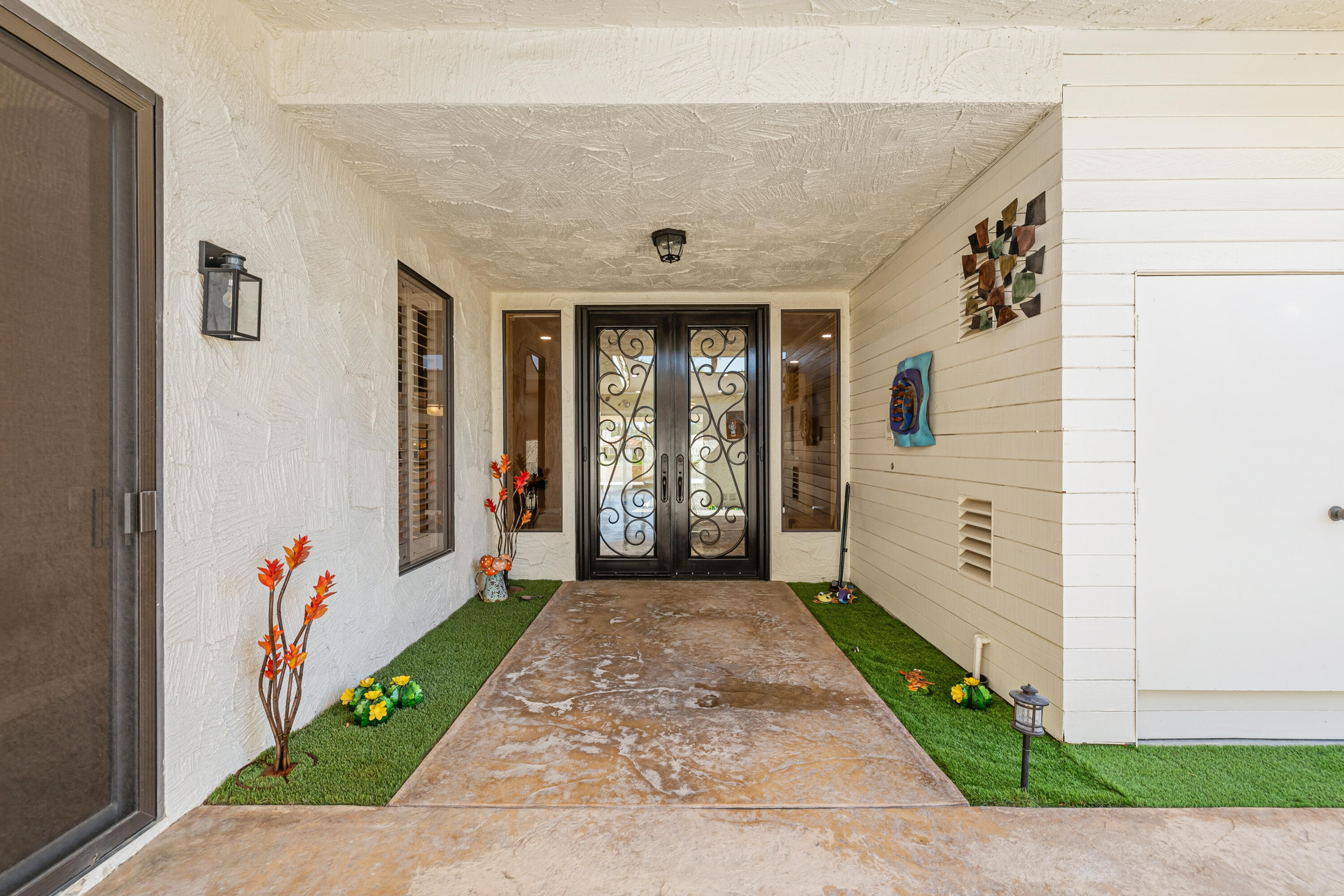 44828 Oro Grande Circle Indian Wells, CA 92210 - Photo 13 of 59 a view of a entryway door of the house