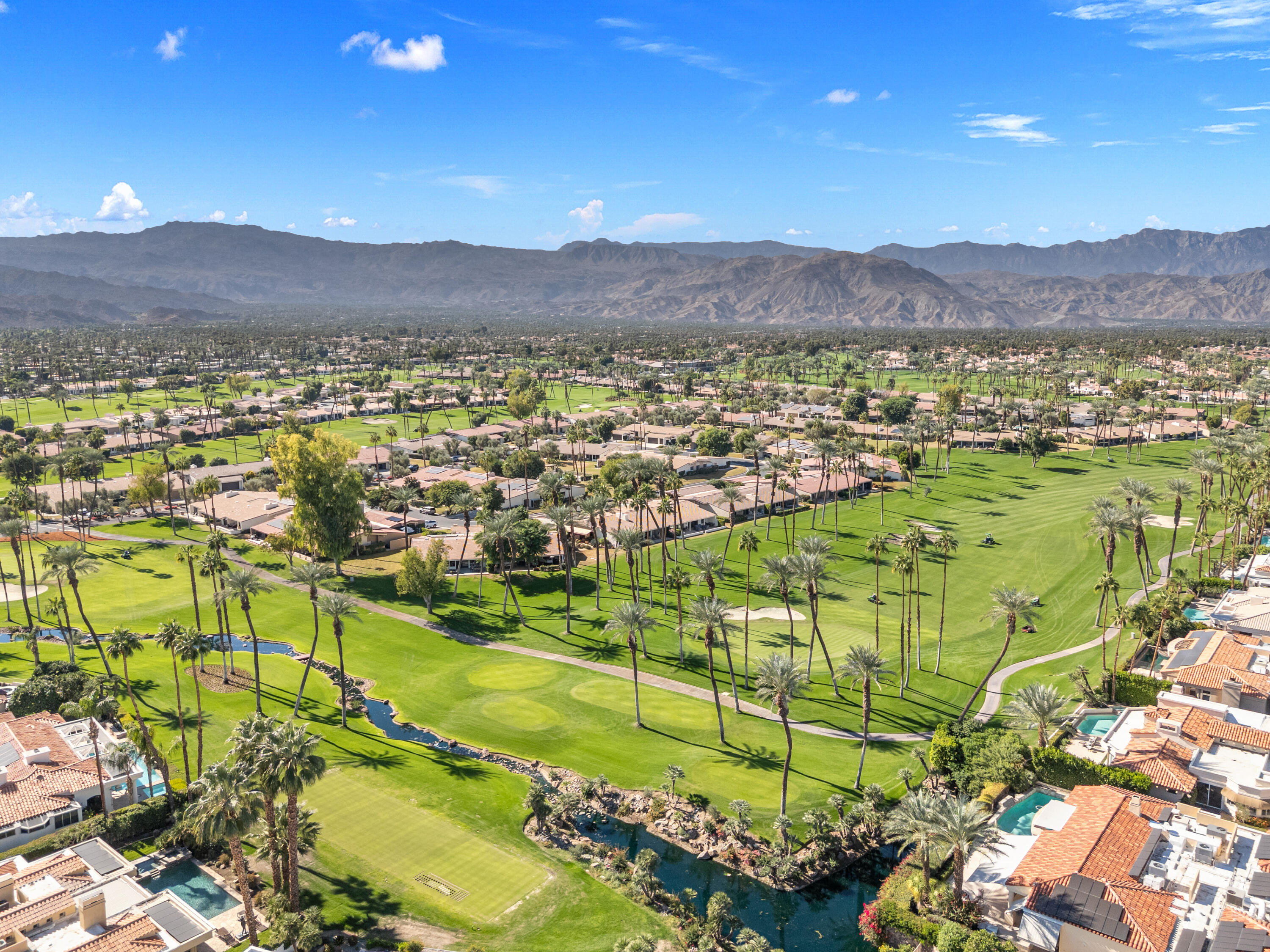44828 Oro Grande Circle Indian Wells, CA 92210 - Photo 2 of 59 a view of a city with mountains in the background