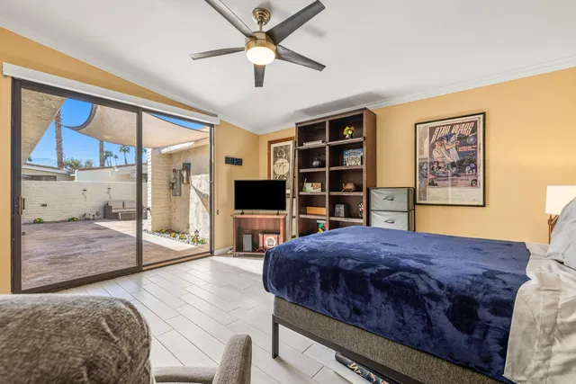 a view of a living room with stainless steel appliances kitchen island