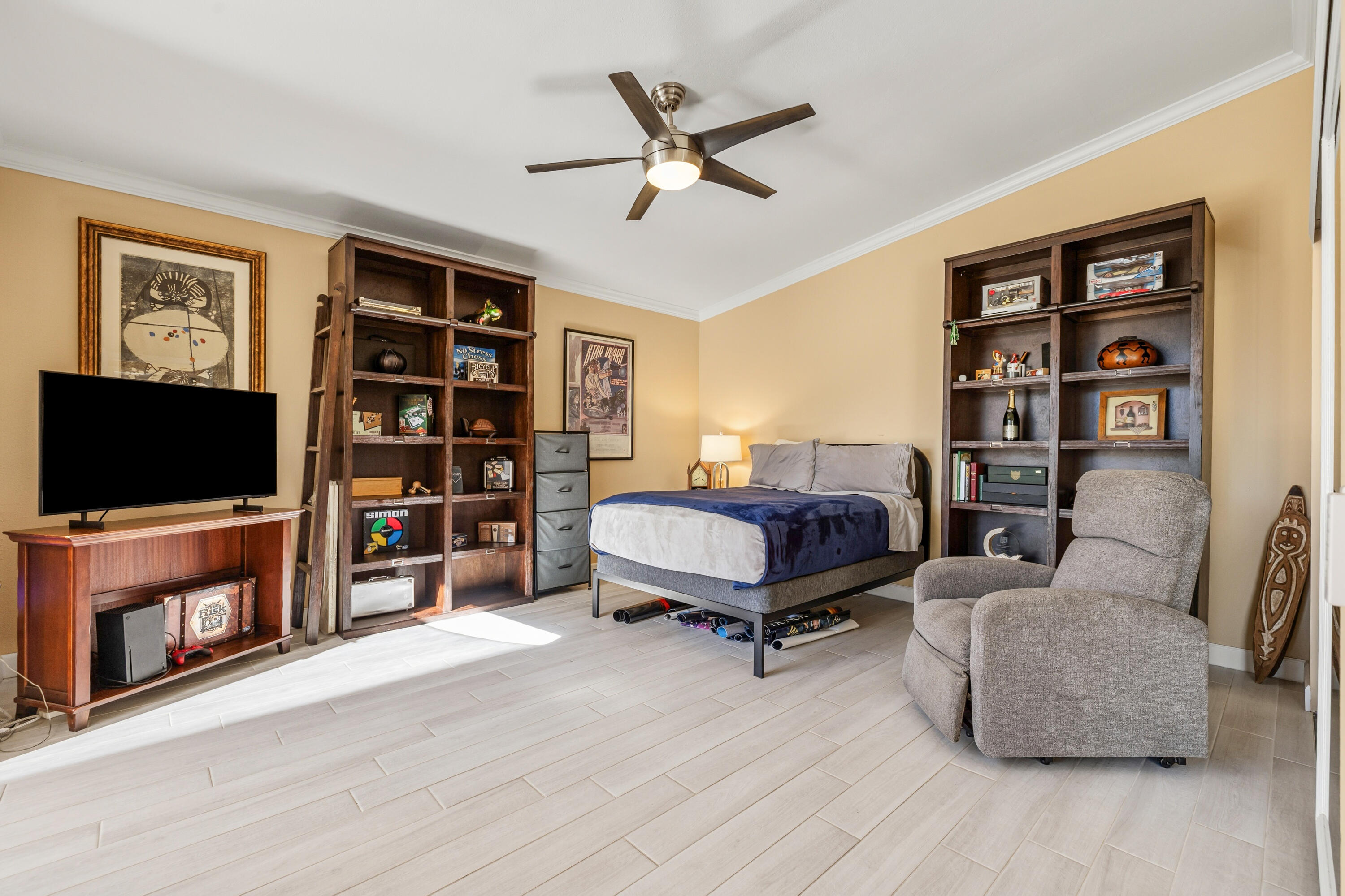 44828 Oro Grande Circle Indian Wells, CA 92210 - Photo 41 of 59 a living room with furniture and a flat screen tv