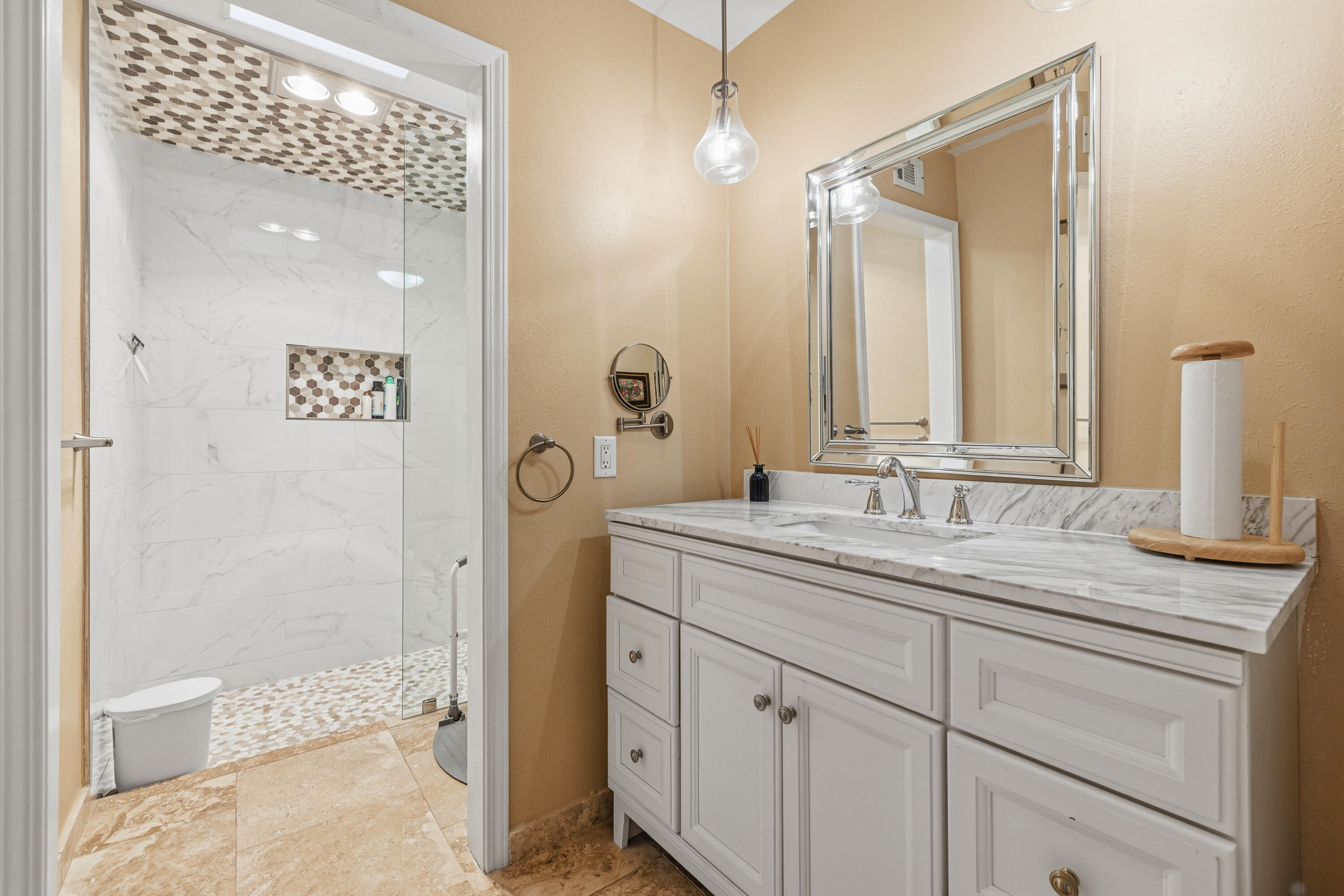 44828 Oro Grande Circle Indian Wells, CA 92210 - Photo 42 of 59 a bathroom with a granite countertop sink mirror and a