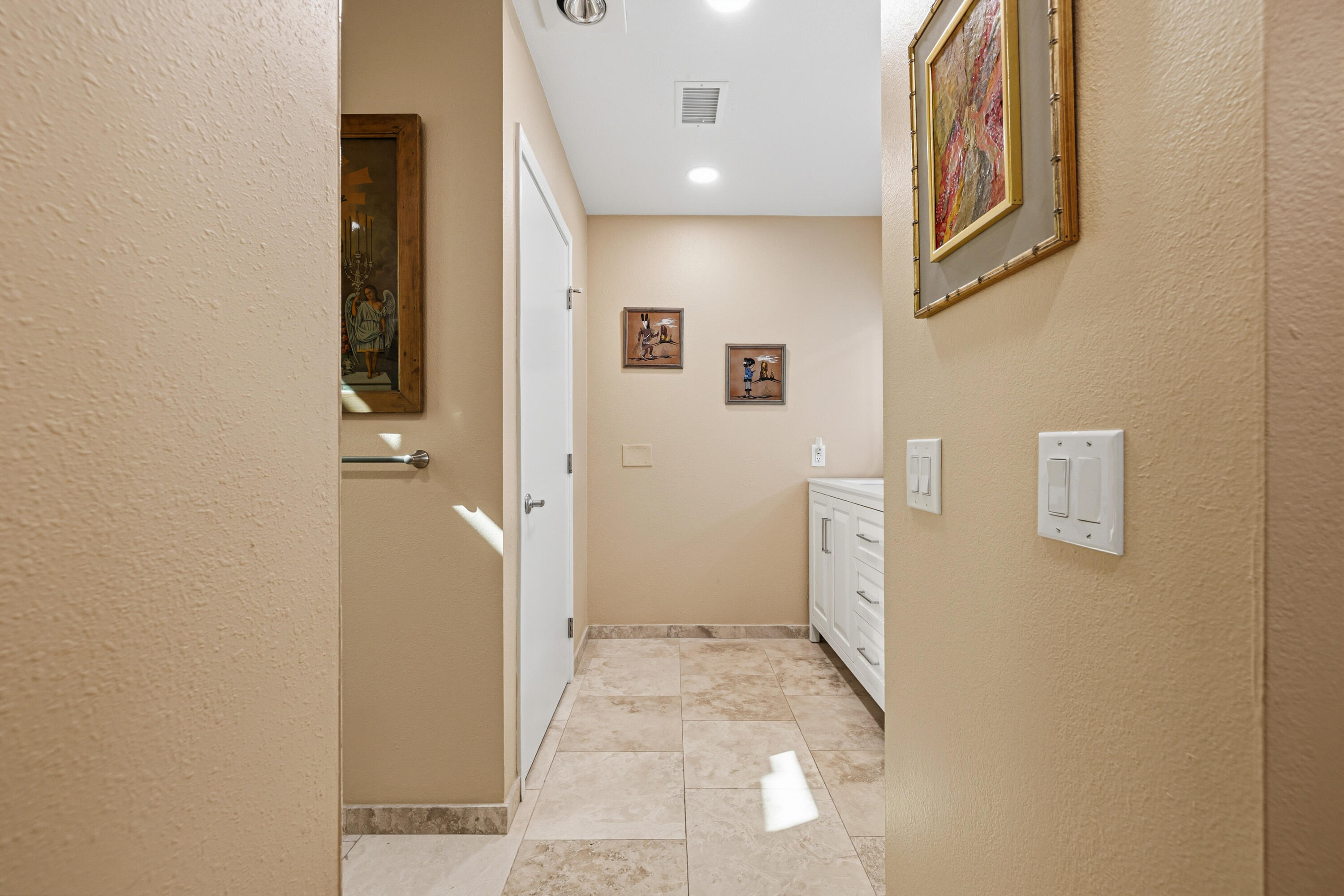 44828 Oro Grande Circle Indian Wells, CA 92210 - Photo 44 of 59 a view of a hallway with bathroom