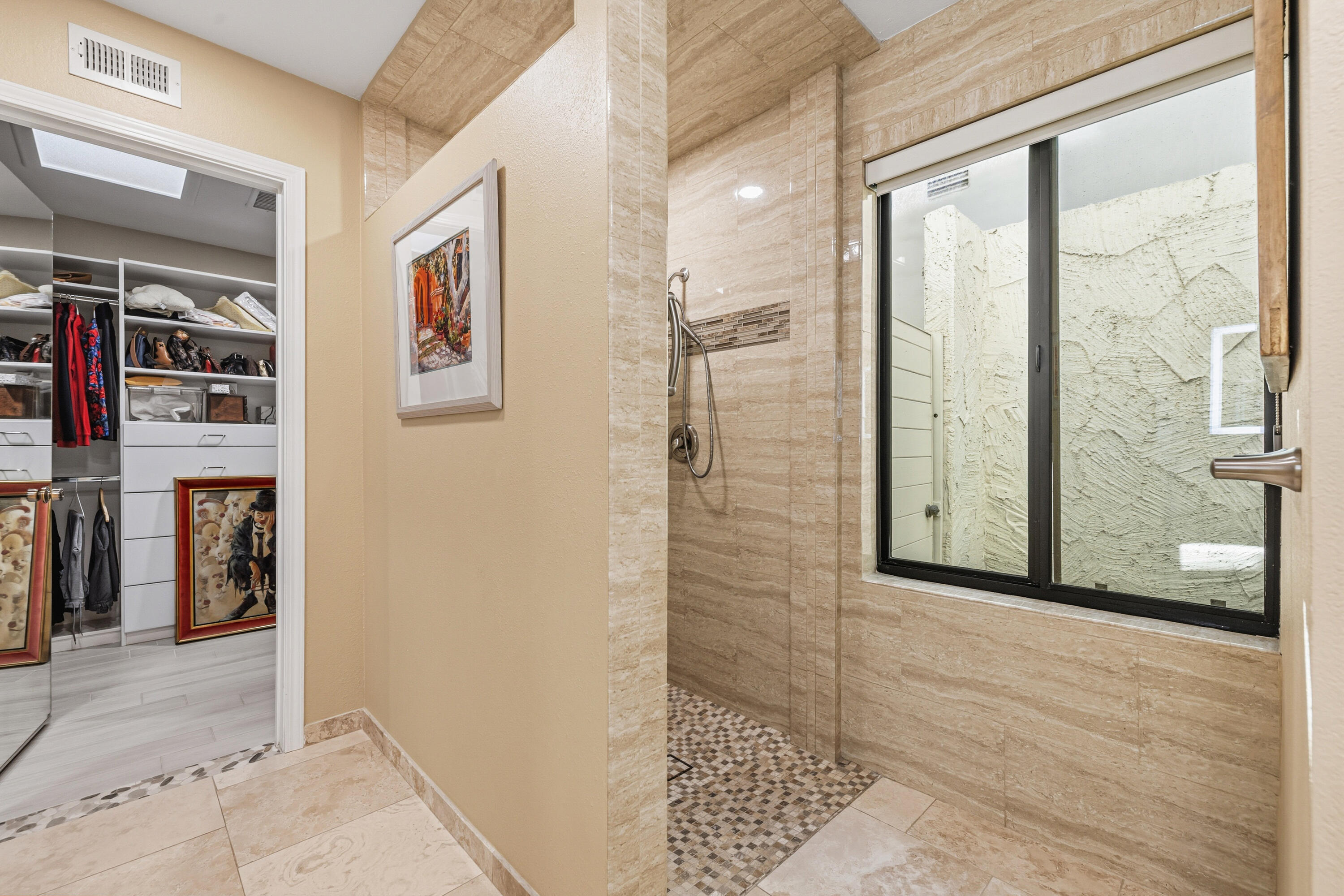 44828 Oro Grande Circle Indian Wells, CA 92210 - Photo 45 of 59 a view of a hallway with wooden floor and windows