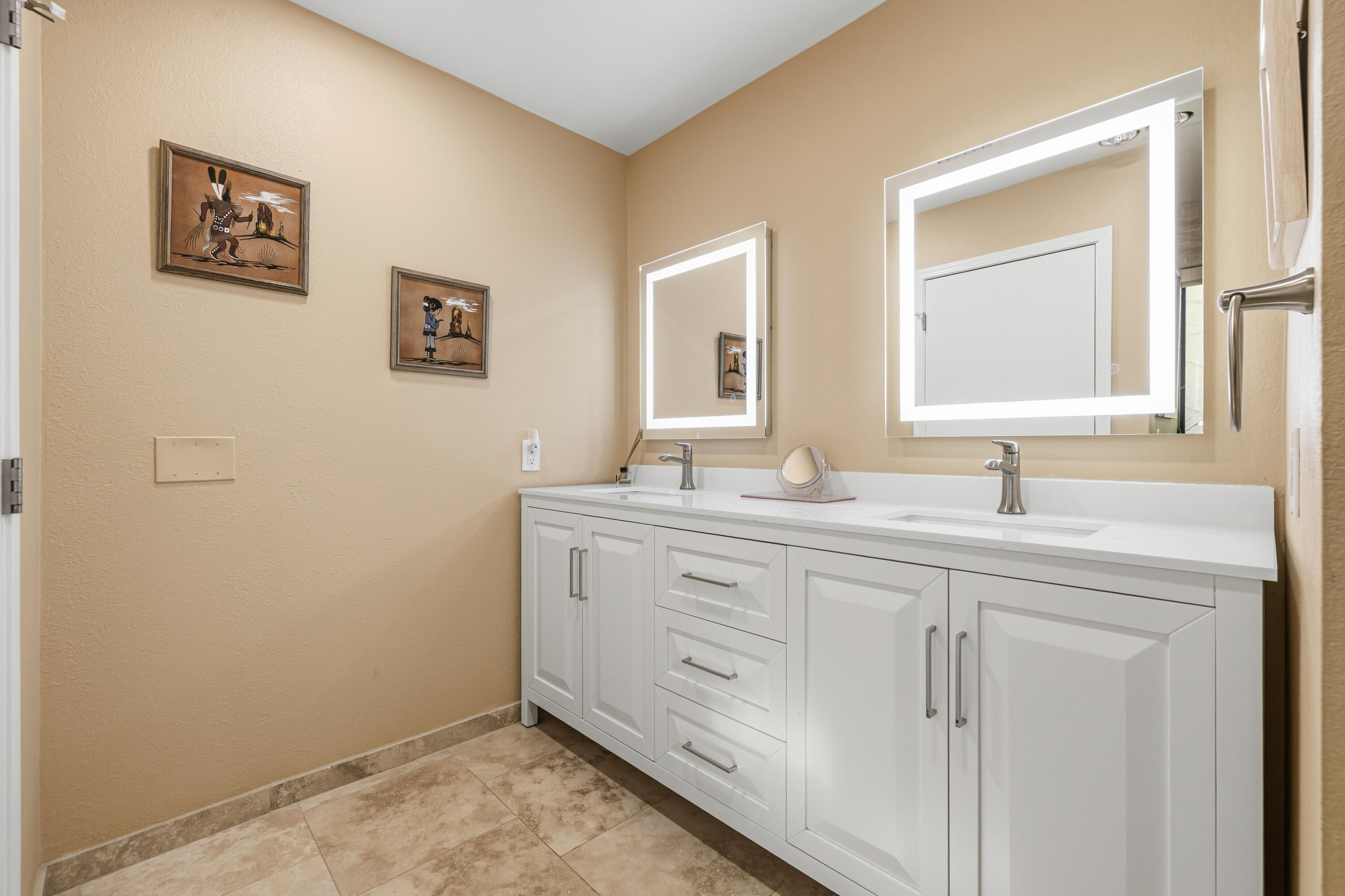 44828 Oro Grande Circle Indian Wells, CA 92210 - Photo 48 of 59 a bathroom with 2 sink and a mirror