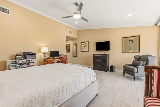 a view of a swimming pool with a patio