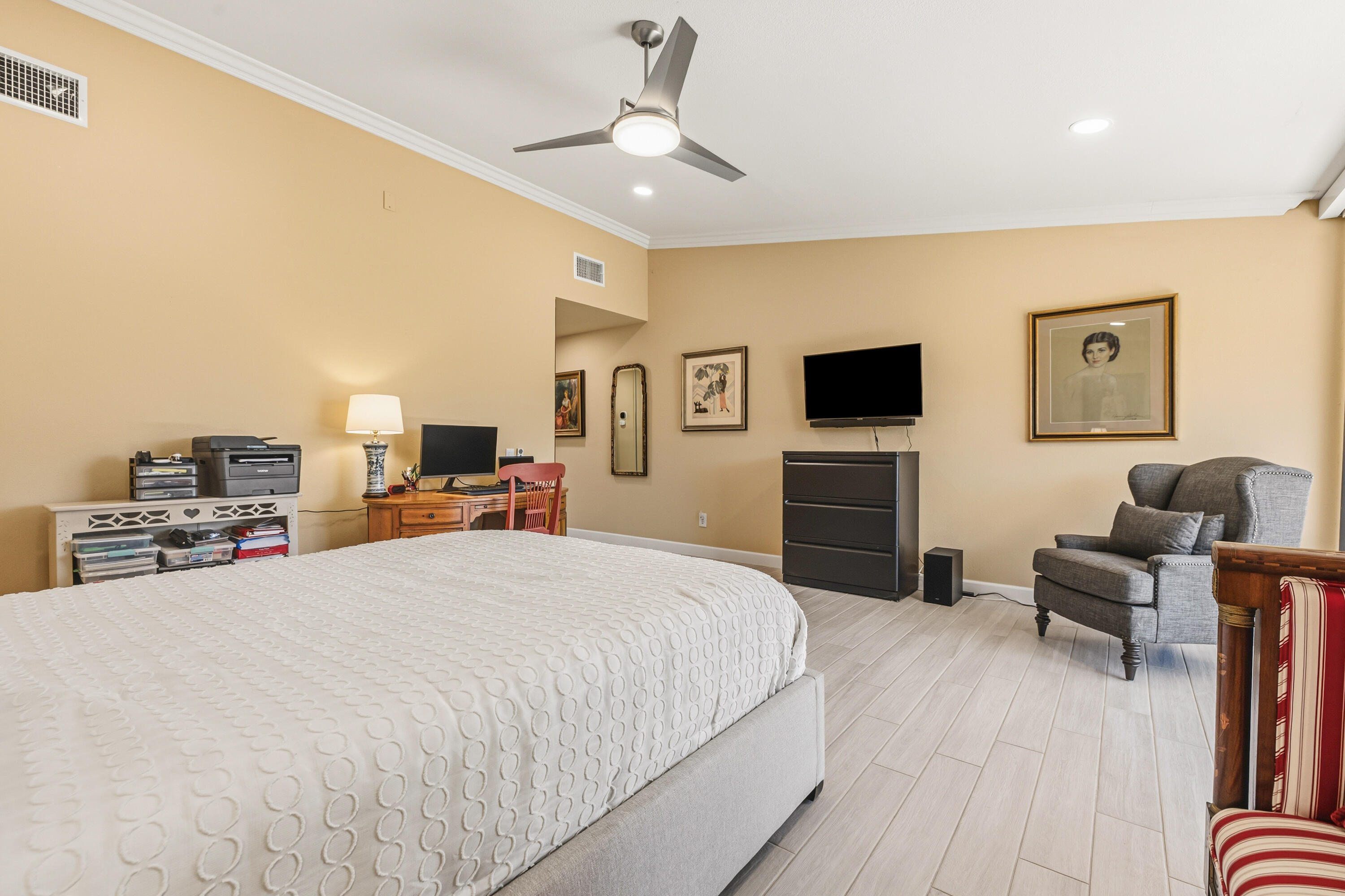 44828 Oro Grande Circle Indian Wells, CA 92210 - Photo 50 of 59 a bedroom with a bed a computer on desk and a chair