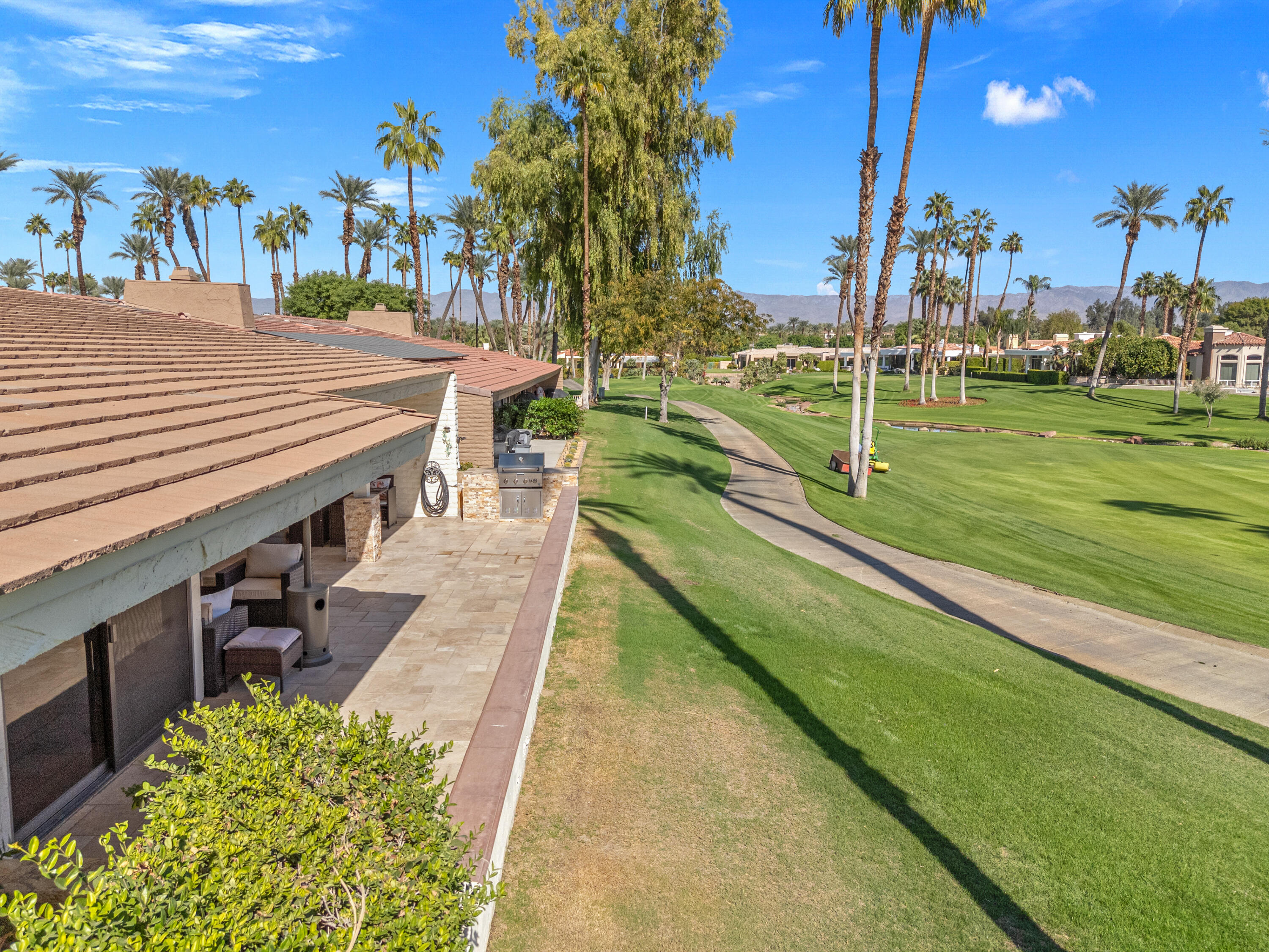 44828 Oro Grande Circle Indian Wells, CA 92210 - Photo 59 of 59 a view of a swimming pool with a patio