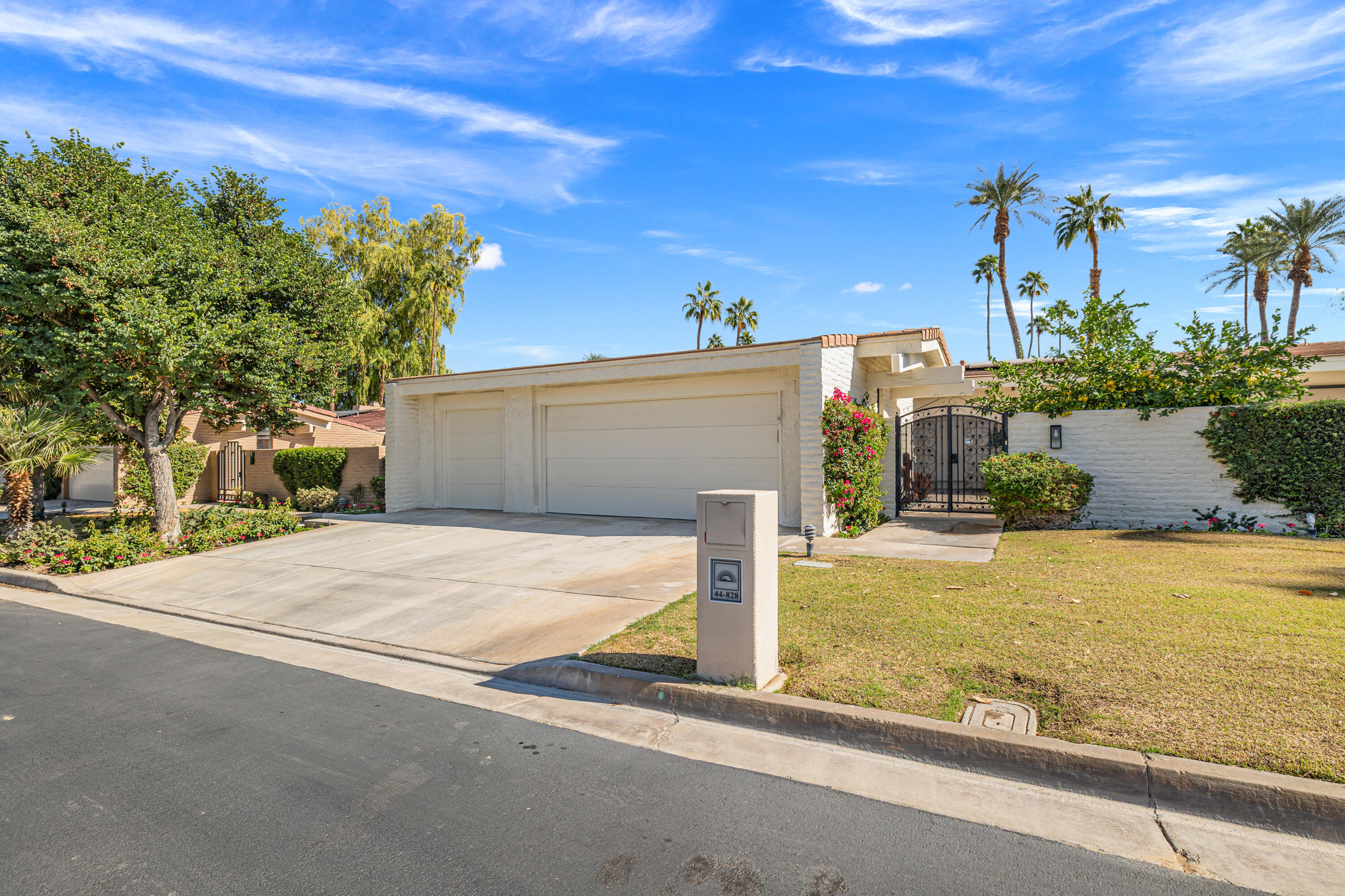 44828 Oro Grande Circle Indian Wells, CA 92210 - Photo 6 of 59 a view of a patio with a table and chairs