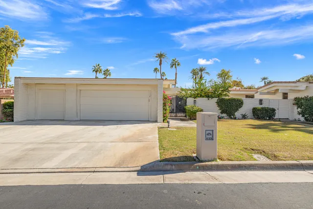 a view of a garden with flowers