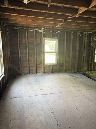 303 Ponakin Road Lancaster, MA 01523 - Photo 3 of 5 a view of empty room with window