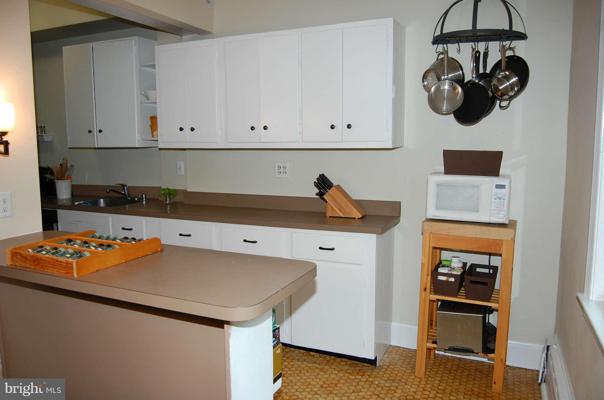 2403 Tunlaw Road Northwest Washington, DC 20007 - Photo 12 of 23 Kitchen and breakfast bar