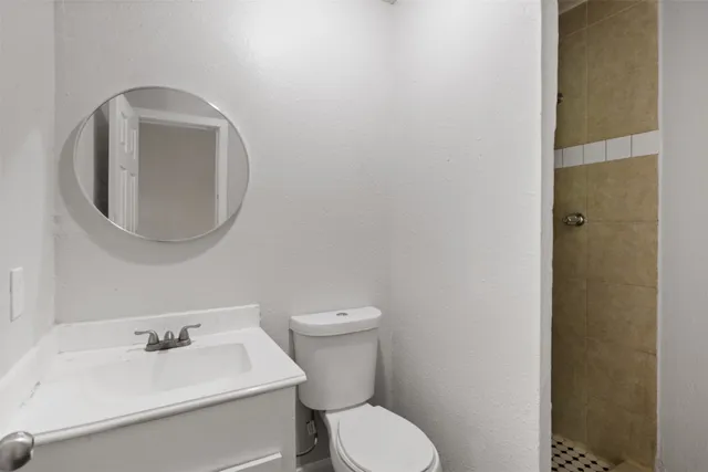 a bathroom with a bathtub and shower