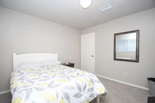 a view of a backyard with hardwood floor and a backyard