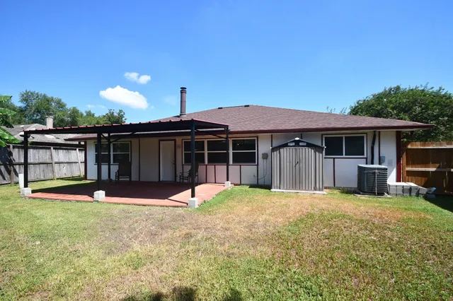 a house with yard in front of it