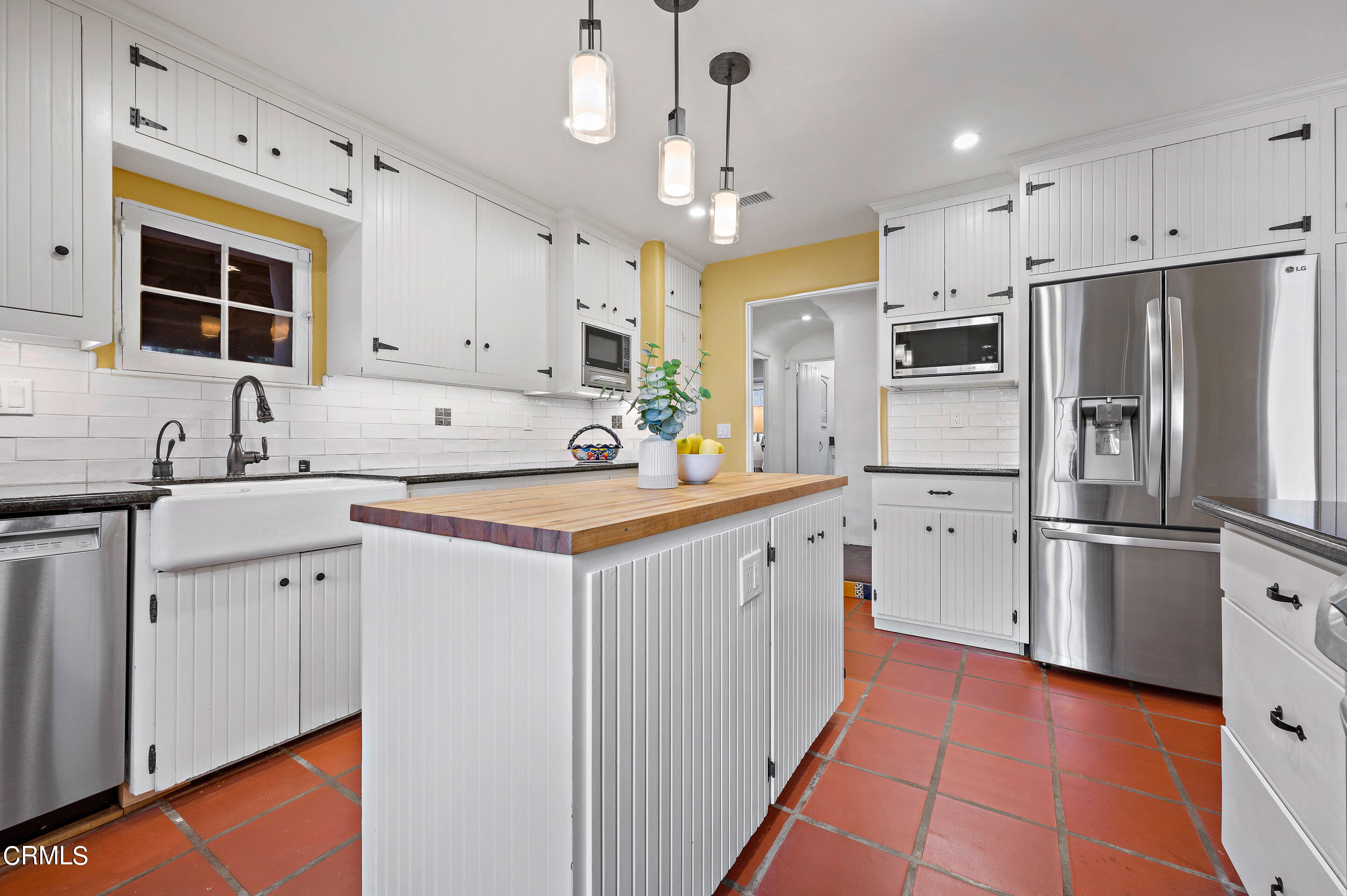 511 Garfield Avenue South Pasadena, CA 91030 - Photo 13 of 46 a kitchen with stainless steel appliances a refrigerator sink and microwave