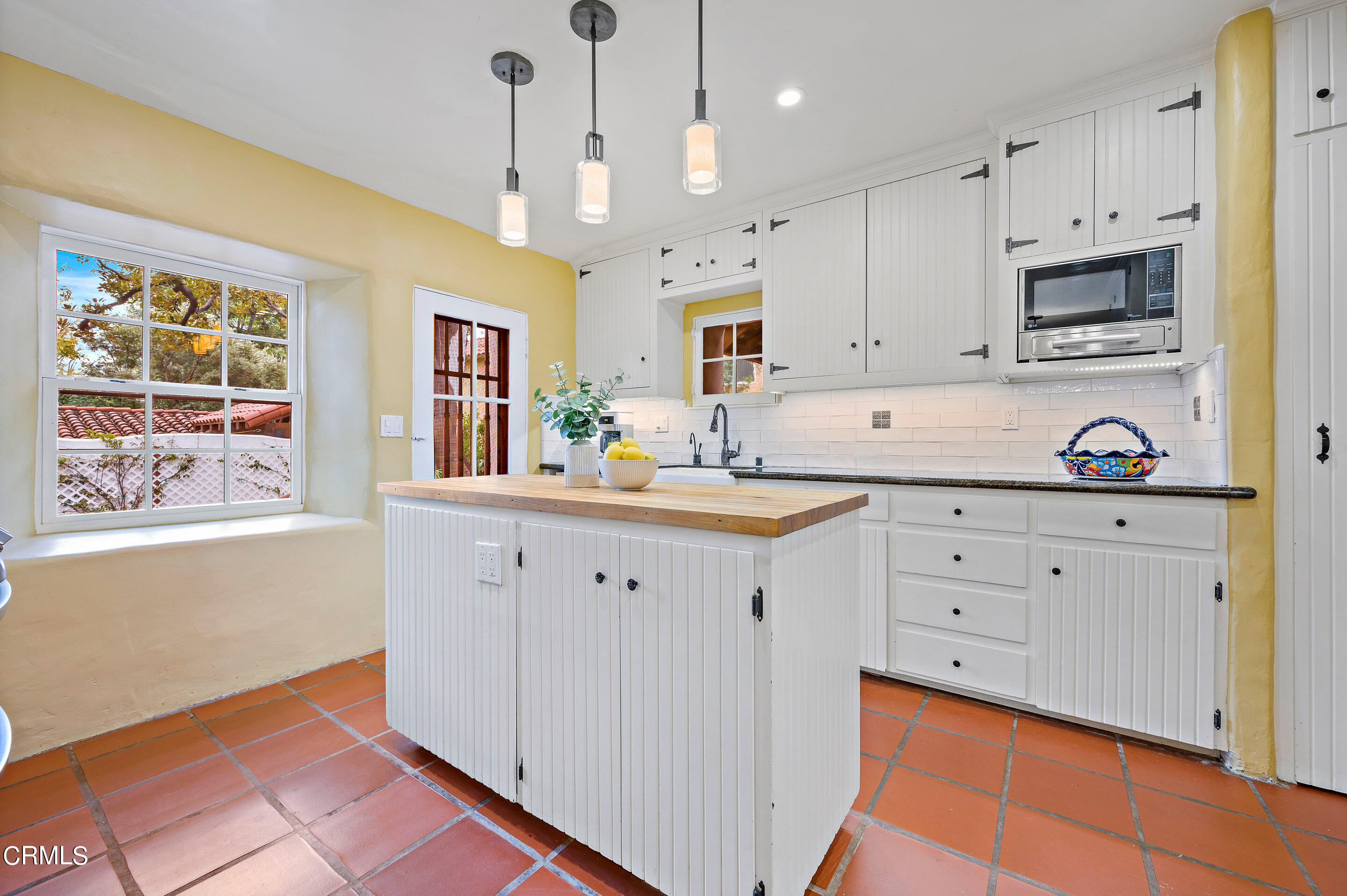 511 Garfield Avenue South Pasadena, CA 91030 - Photo 14 of 46 a kitchen with granite countertop white cabinets white stainless steel appliances and sink