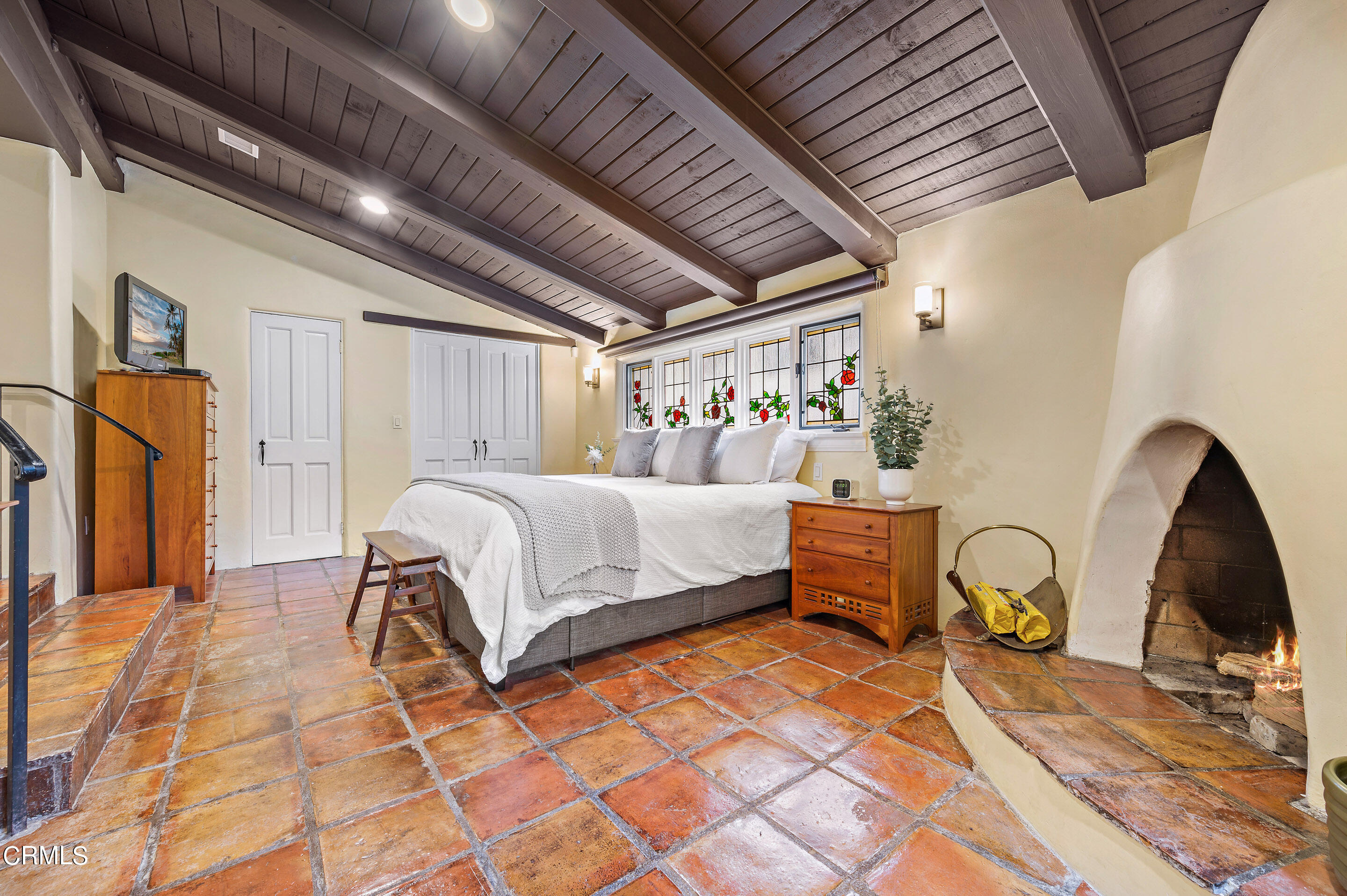 511 Garfield Avenue South Pasadena, CA 91030 - Photo 19 of 46 a bedroom with a bed and a dresser next to a window