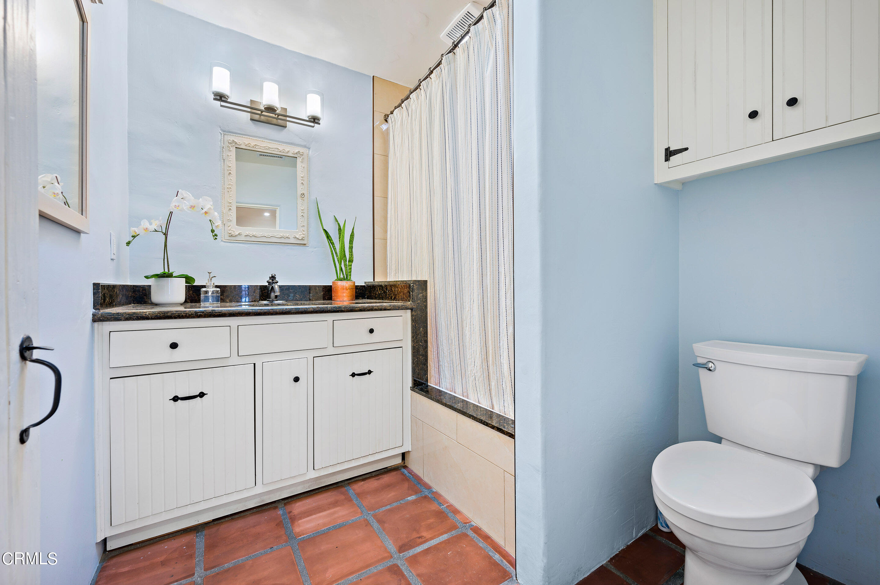 511 Garfield Avenue South Pasadena, CA 91030 - Photo 27 of 46 a bathroom with a toilet sink and mirror