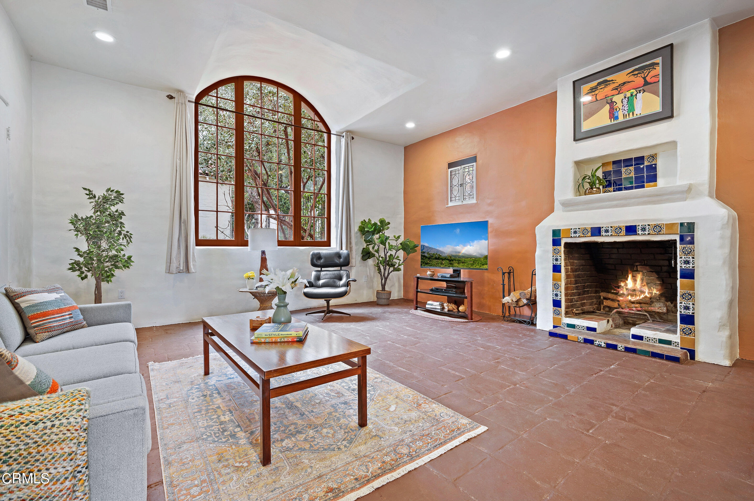 511 Garfield Avenue South Pasadena, CA 91030 - Photo 8 of 46 a living room with furniture a fireplace and a potted plant