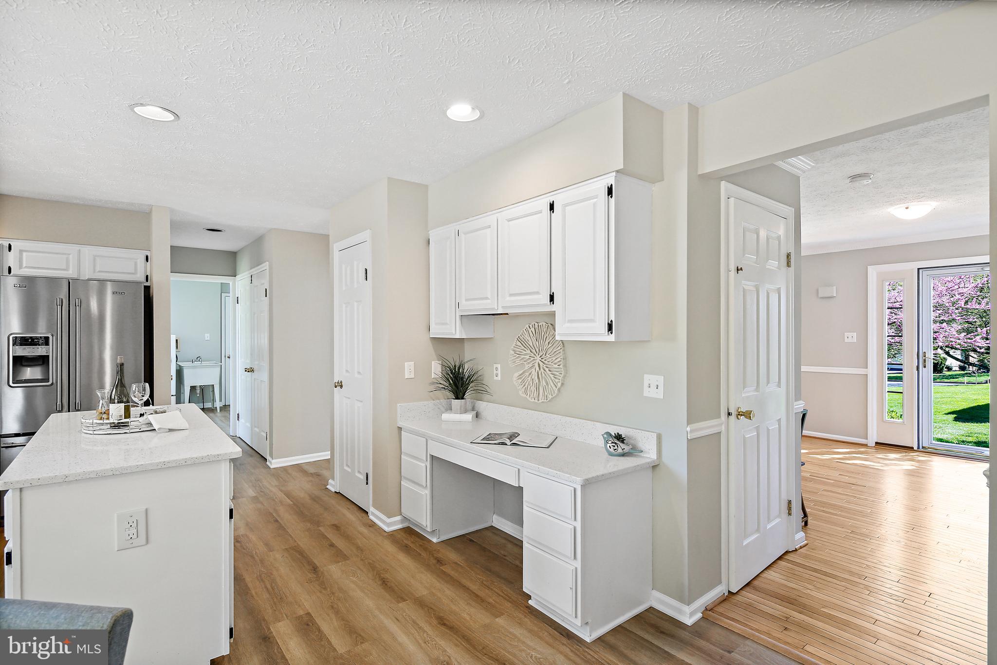 10268 Wetherburn Road Ellicott City, MD 21042 - Photo 15 of 40 Kitchen with bonus work space/additional cabinetry
