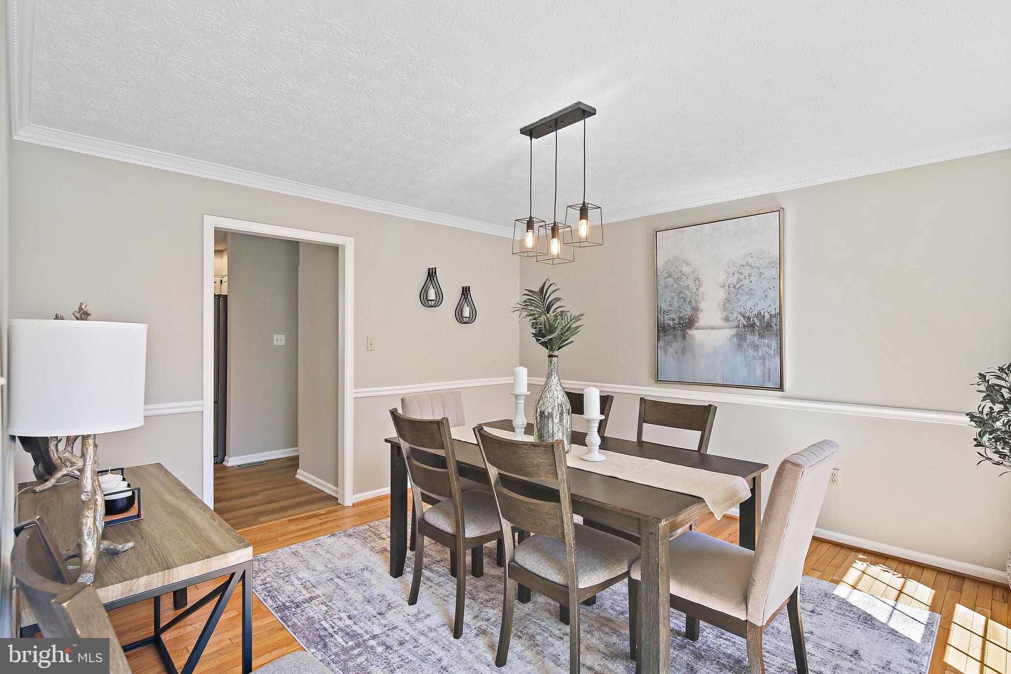 10268 Wetherburn Road Ellicott City, MD 21042 - Photo 9 of 40 Dining Room with chair rail