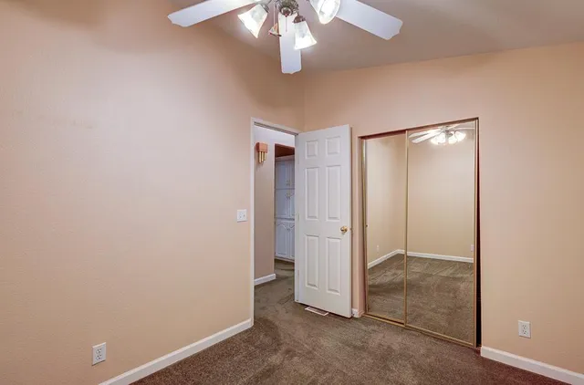 an empty room with a bathroom