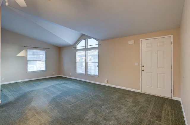 a view of a kitchen with a stove cabinets and a kitchen