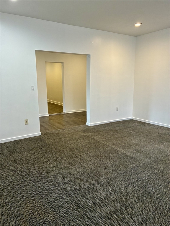 382 Commonwealth Avenue, Unit B1 Boston, MA 02215 - Photo 13 of 22 an empty room with an entryway