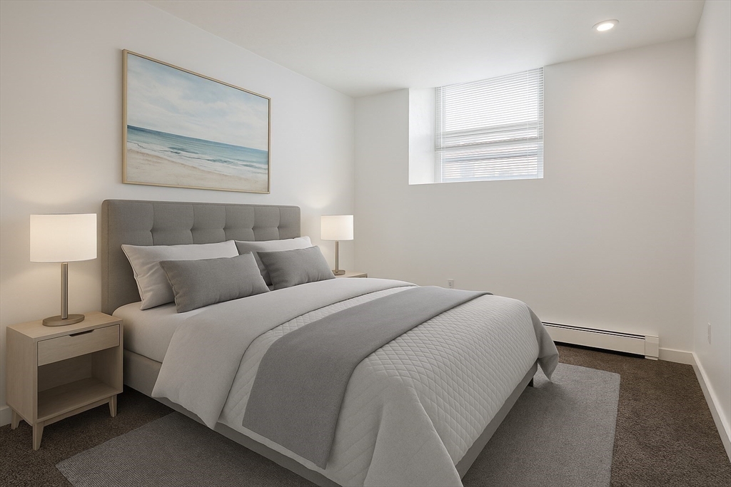 382 Commonwealth Avenue, Unit B1 Boston, MA 02215 - Photo 8 of 22 a bedroom with a bed and a window