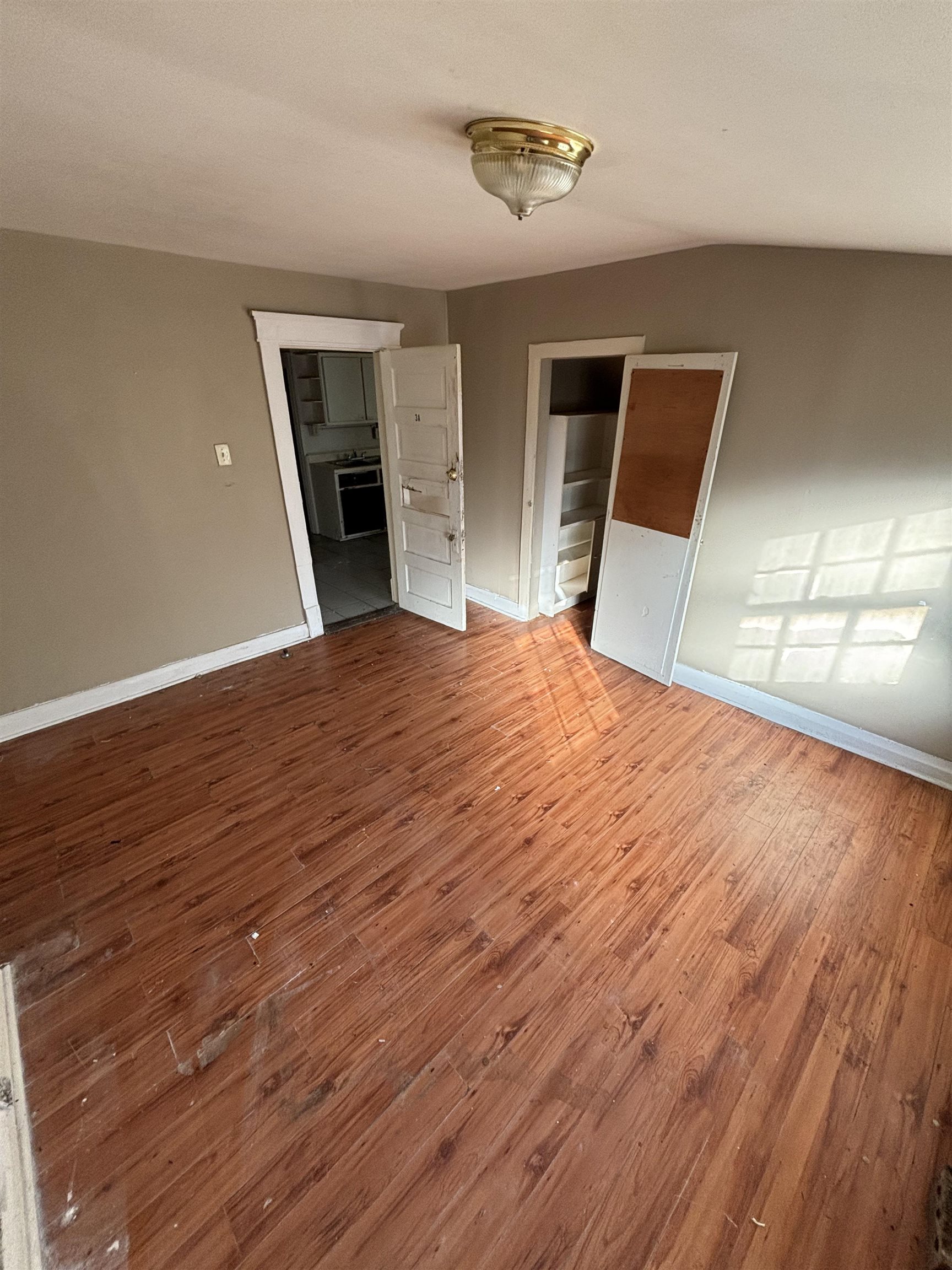 1920 Oliver Avenue Memphis, TN 38104 - Photo 8 of 19 Interior space featuring baseboards and wood finished floors